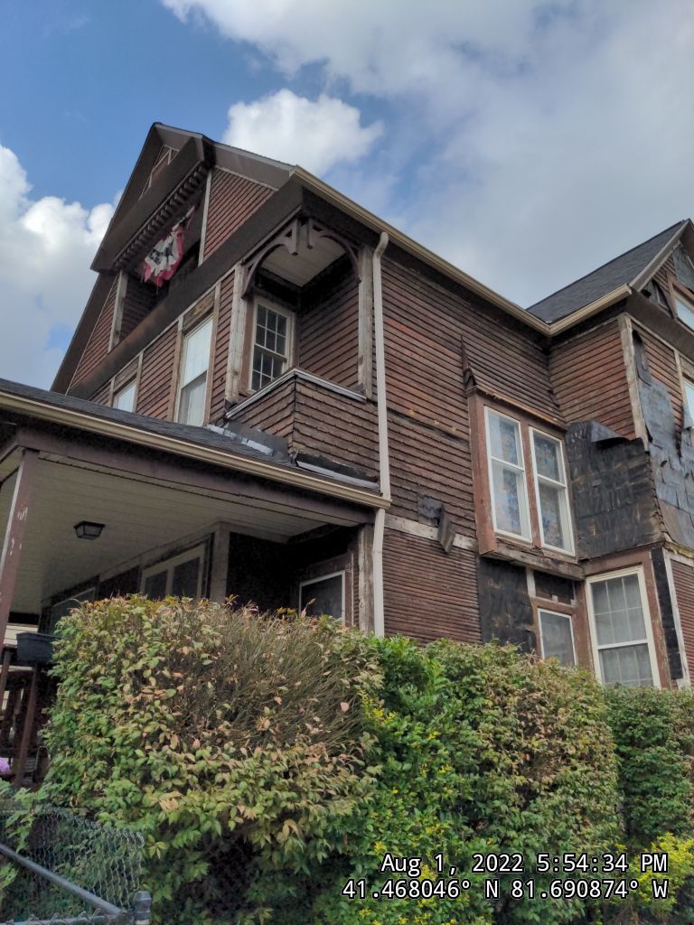Fire damaged home in Tremont by Absolute Roofing and Construction