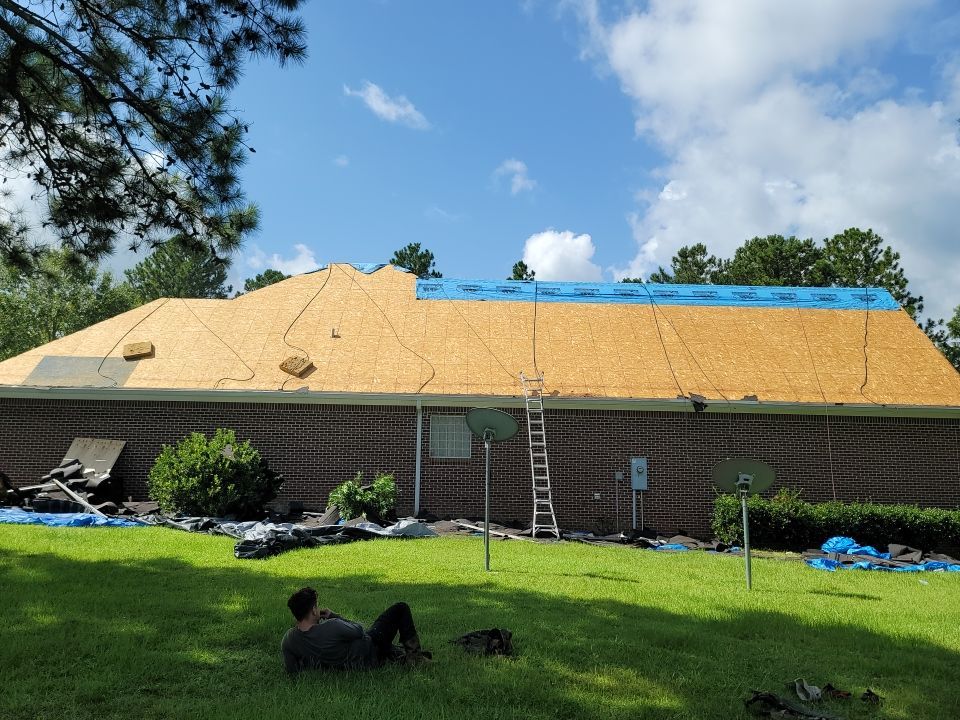 Residential Roofing Installation using Roof Replacement by American Roofing & Construction LLC