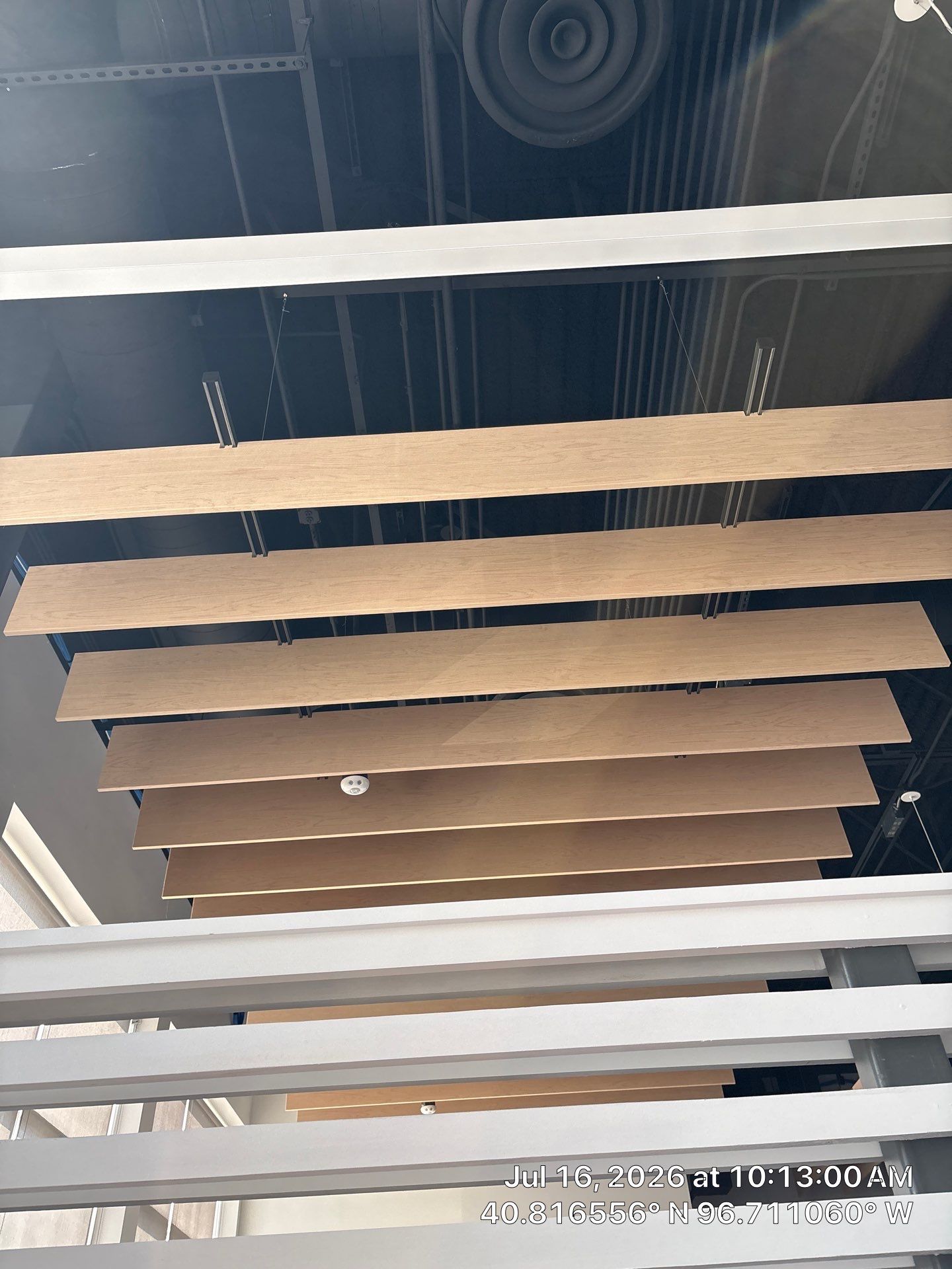 Commercial Office Remodel Featuring Custom Acoustic Wood Baffles in Lincoln by CompanyCam Sales Demo