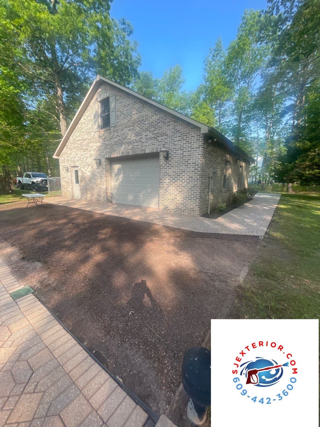 Pavers Cleaned, Garage and Concrete walls by SJ Exterior