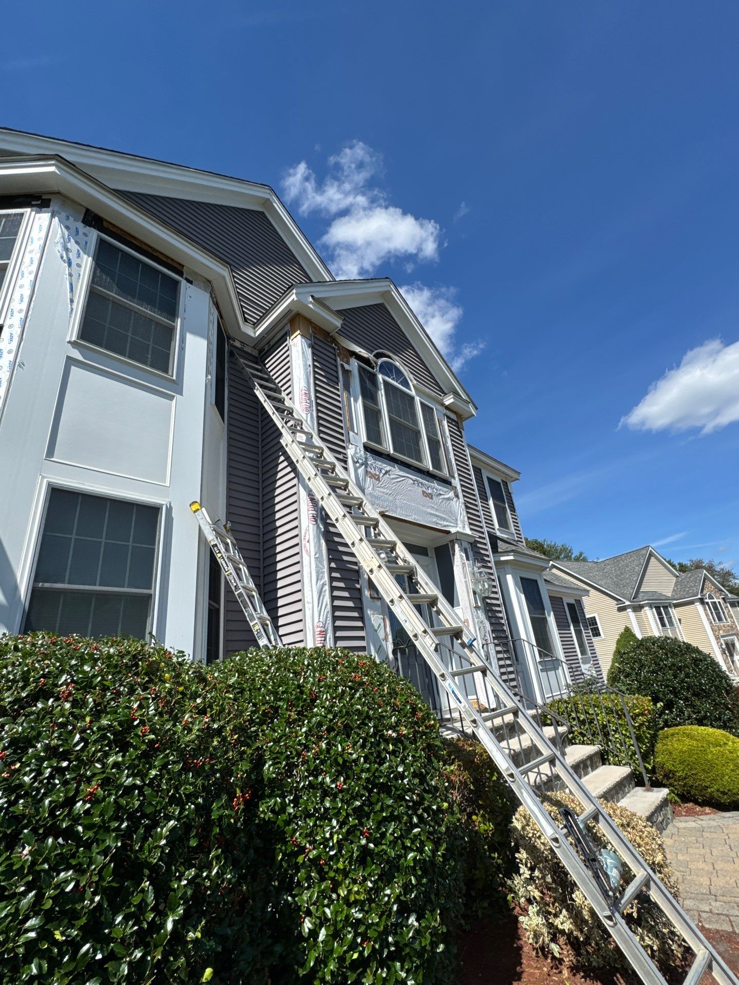 Roof, Trim, Deck, and Gutter Restoration by Mighty Dog Roofing of Greater Middlesex County