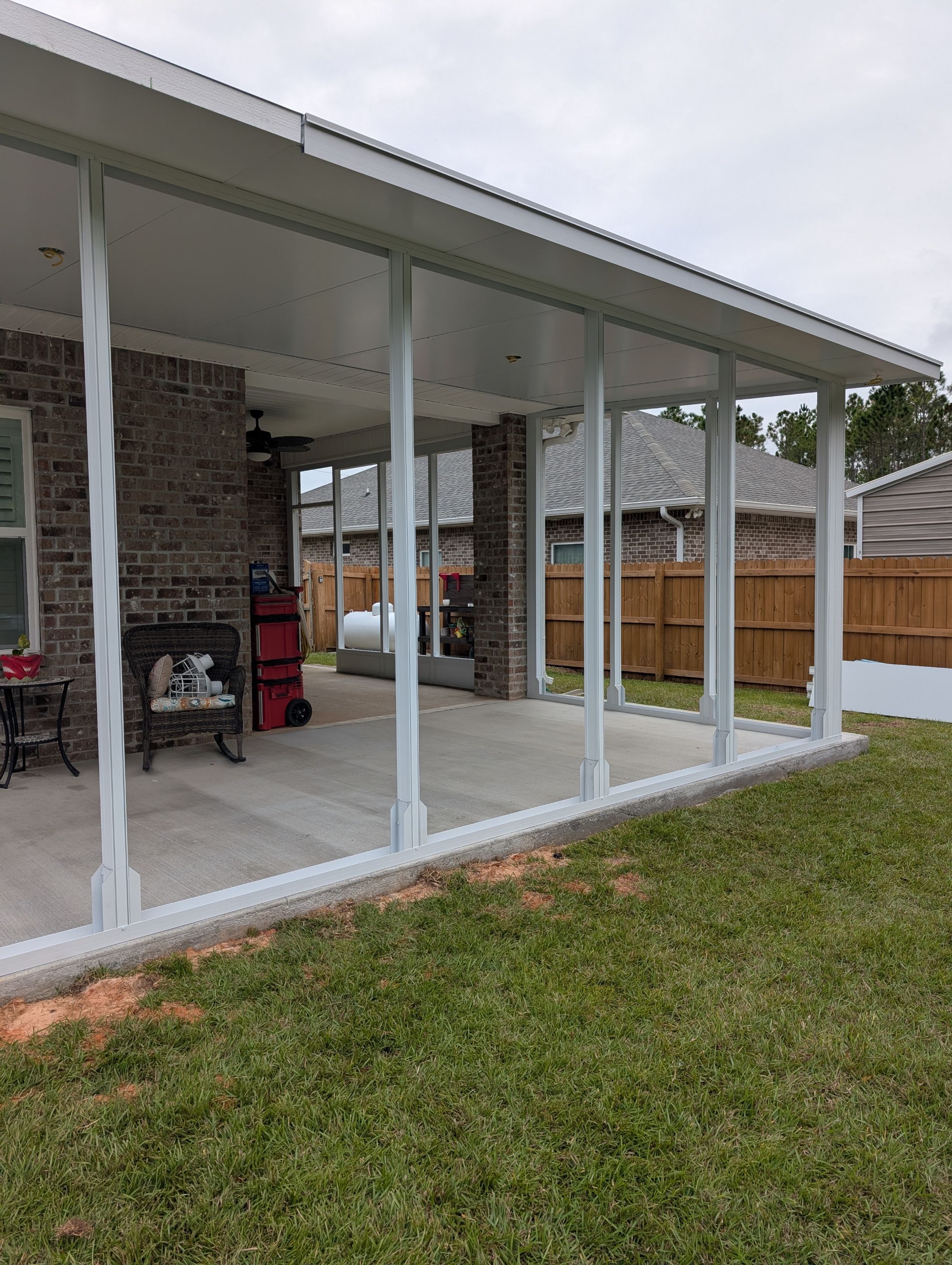 Home addition w/Vinyl 4-Track Windows by Titan Sunrooms