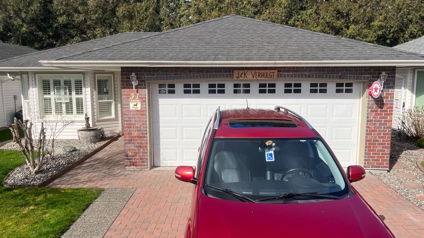 Residential ReRoofing Installation using OC Estate Gray Shingles by Top Notch Roofing Inc