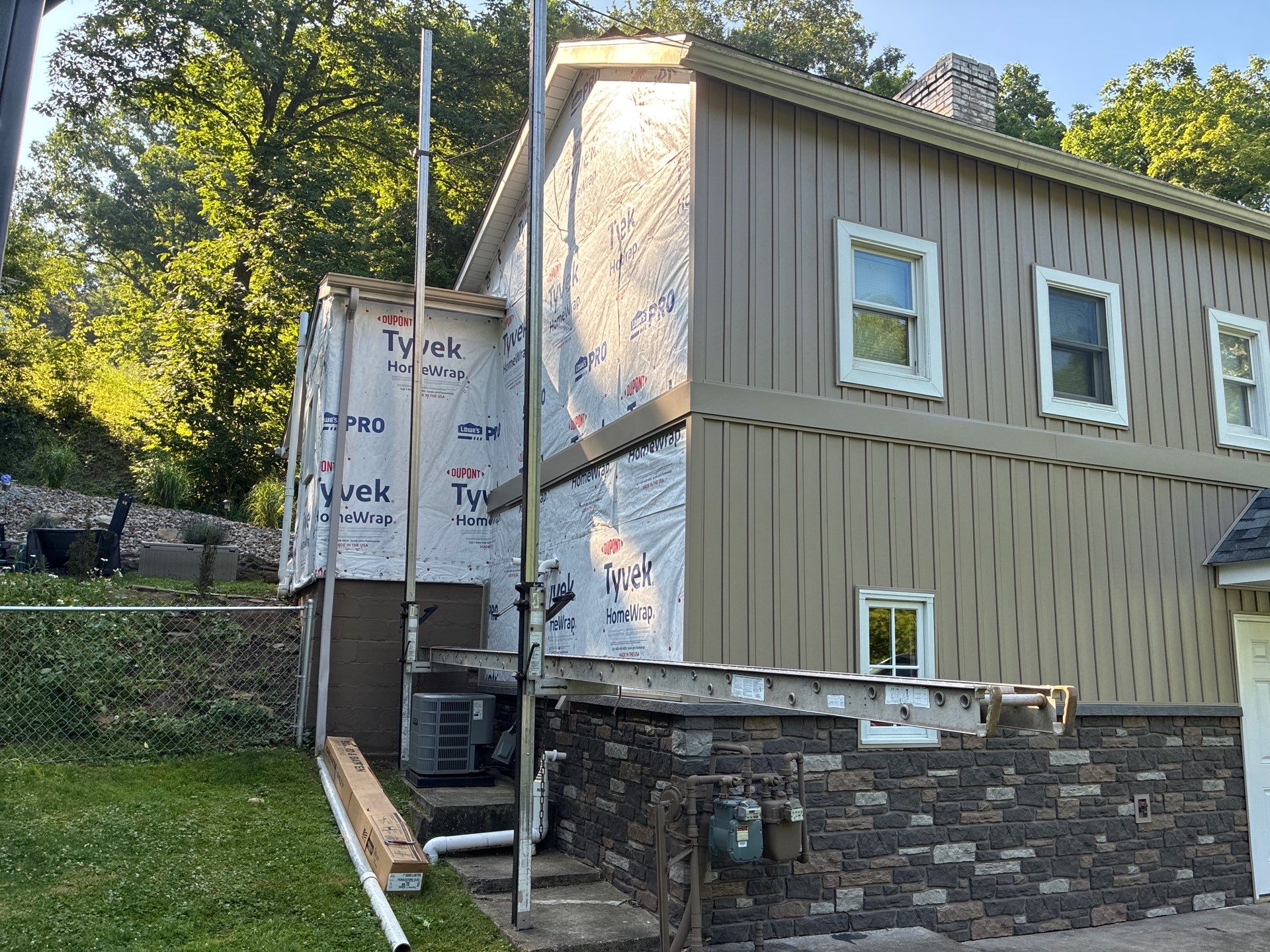 Jefferson Hills Vertical Board and Batten Siding and TandoStone Renovation by Ideal Siding Pittsburgh