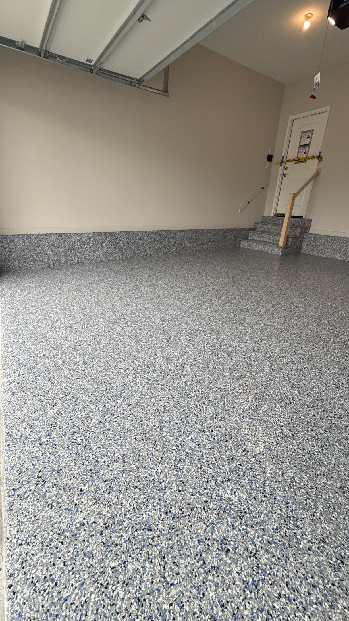 A Beautiful Comet Flake Floor  by Banner Garage