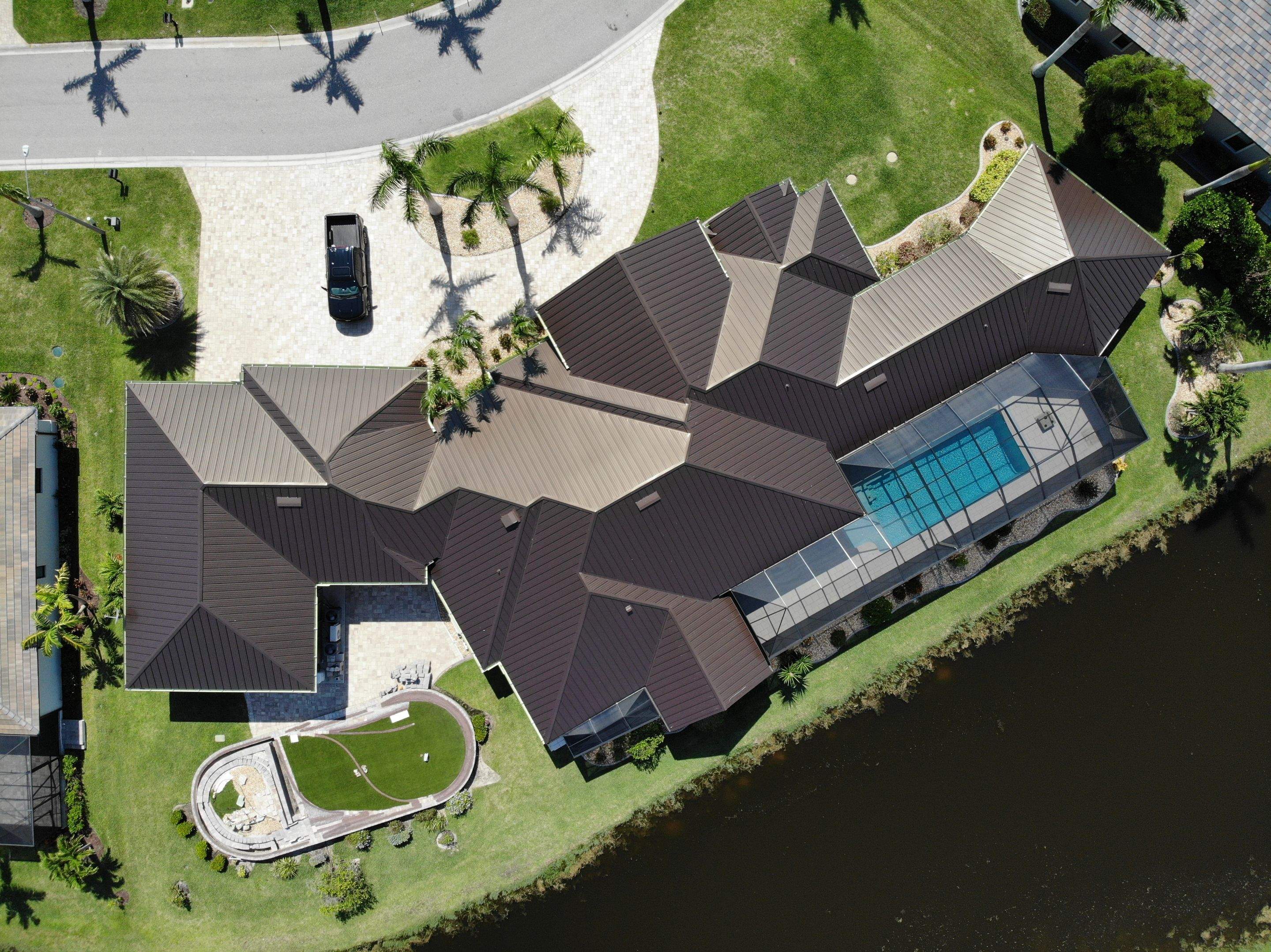 Residential Roofing Installation using Standing Seam Metal Roof in Cape Coral, FL by International Roofing