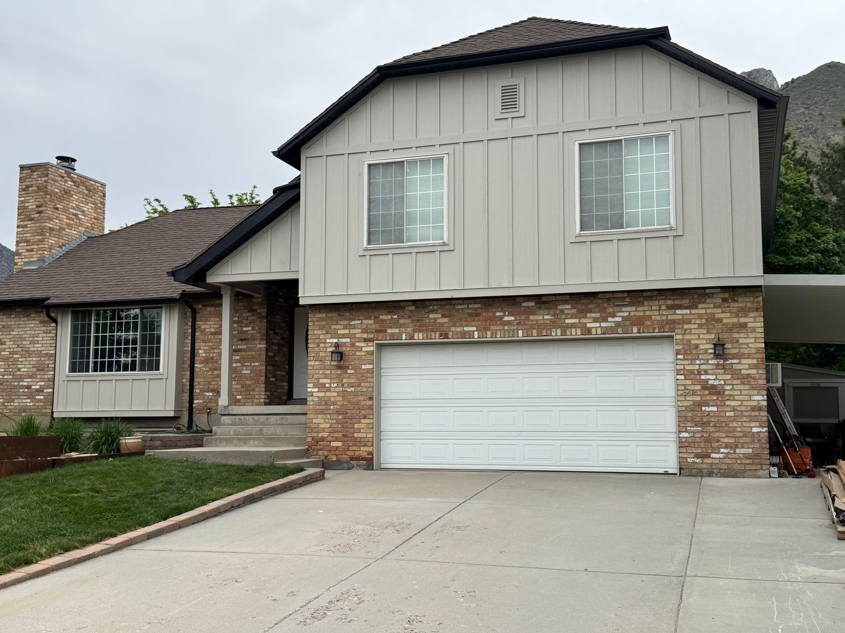 Cottonwood Heights | Custom Hardie Exterior & Bold Fascia | Cobble Stone Accents by Ideal Siding Utah
