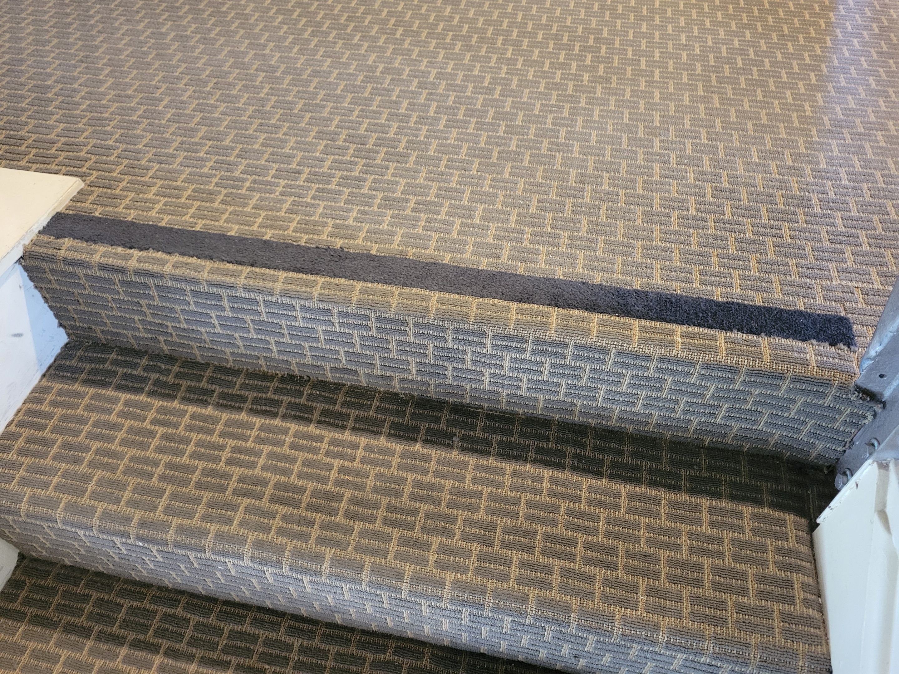 Loose Step on Commercial Glue Down by Ardent Carpet Restore LLC