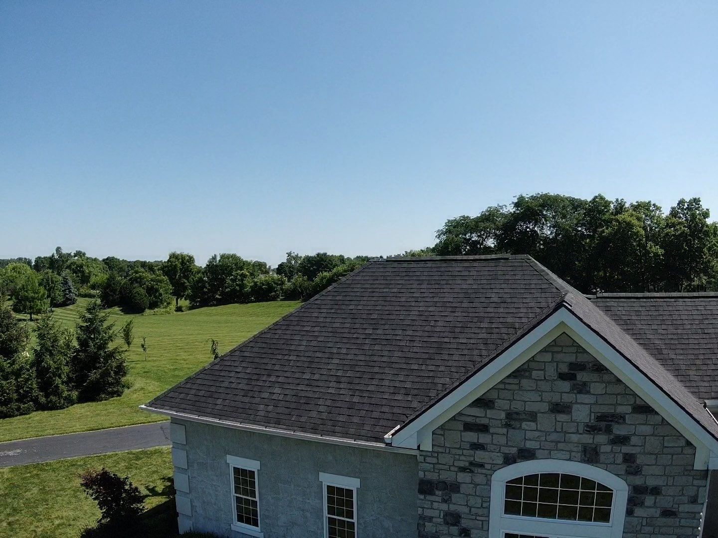 Residential Roofing Installation using Atlas Pinnacle Black Shingles by 614 Exteriors