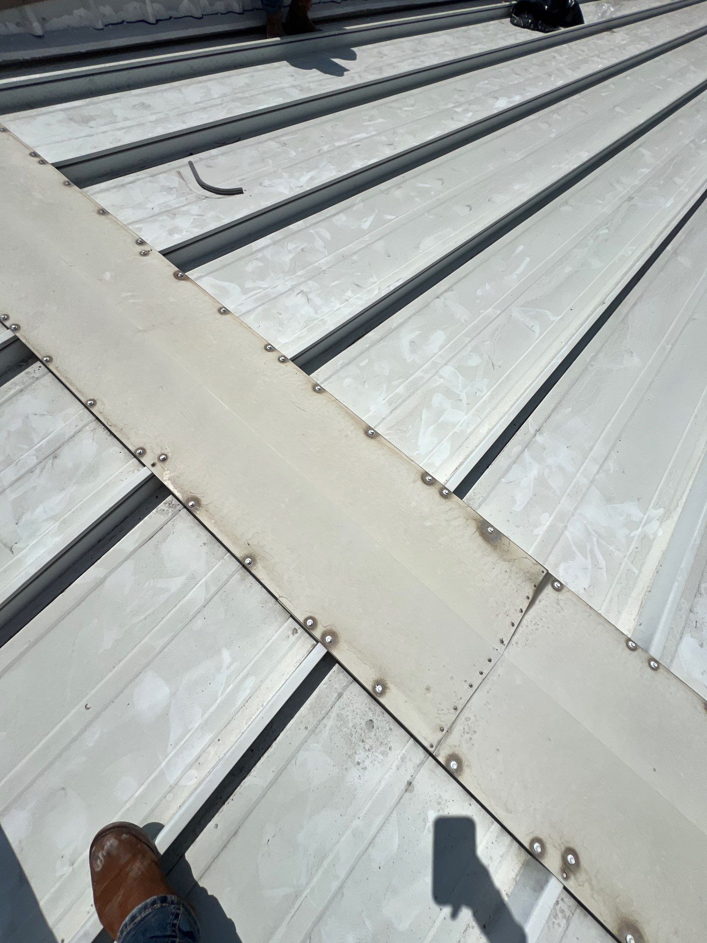 Commercial Roofing Repair using Metal by Roof Repair Company