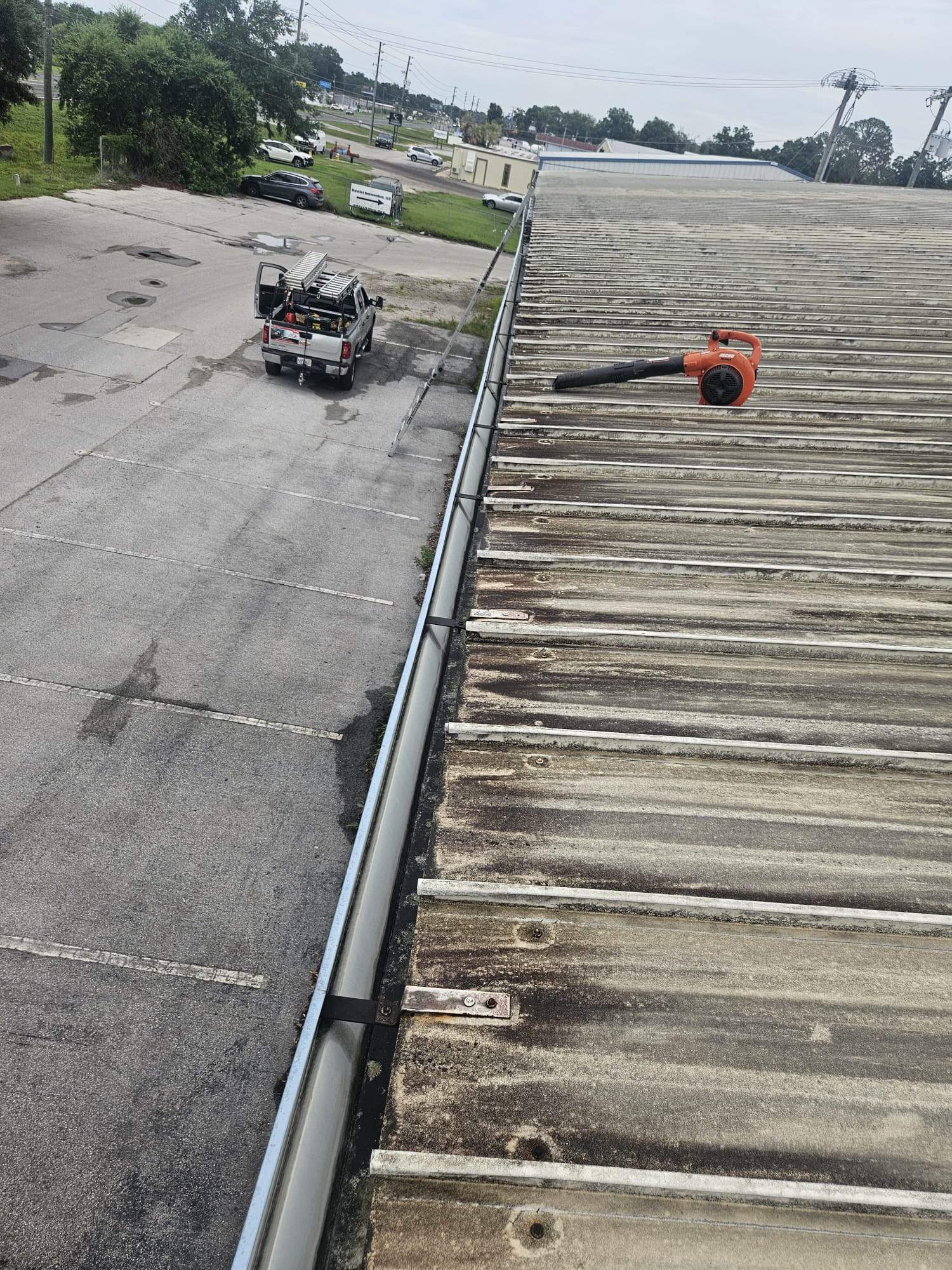 Clean Gutters and Seal Seams in Lakeland FL by Gutter Professors