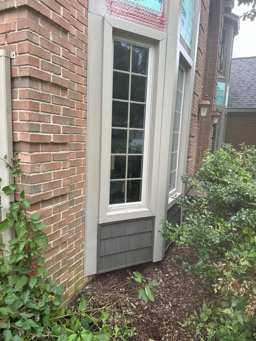 Roof Replacement using Owens Corning Peppercorn and Siding Replacement using Ascend Charcoal Smoke by 180 Contractors