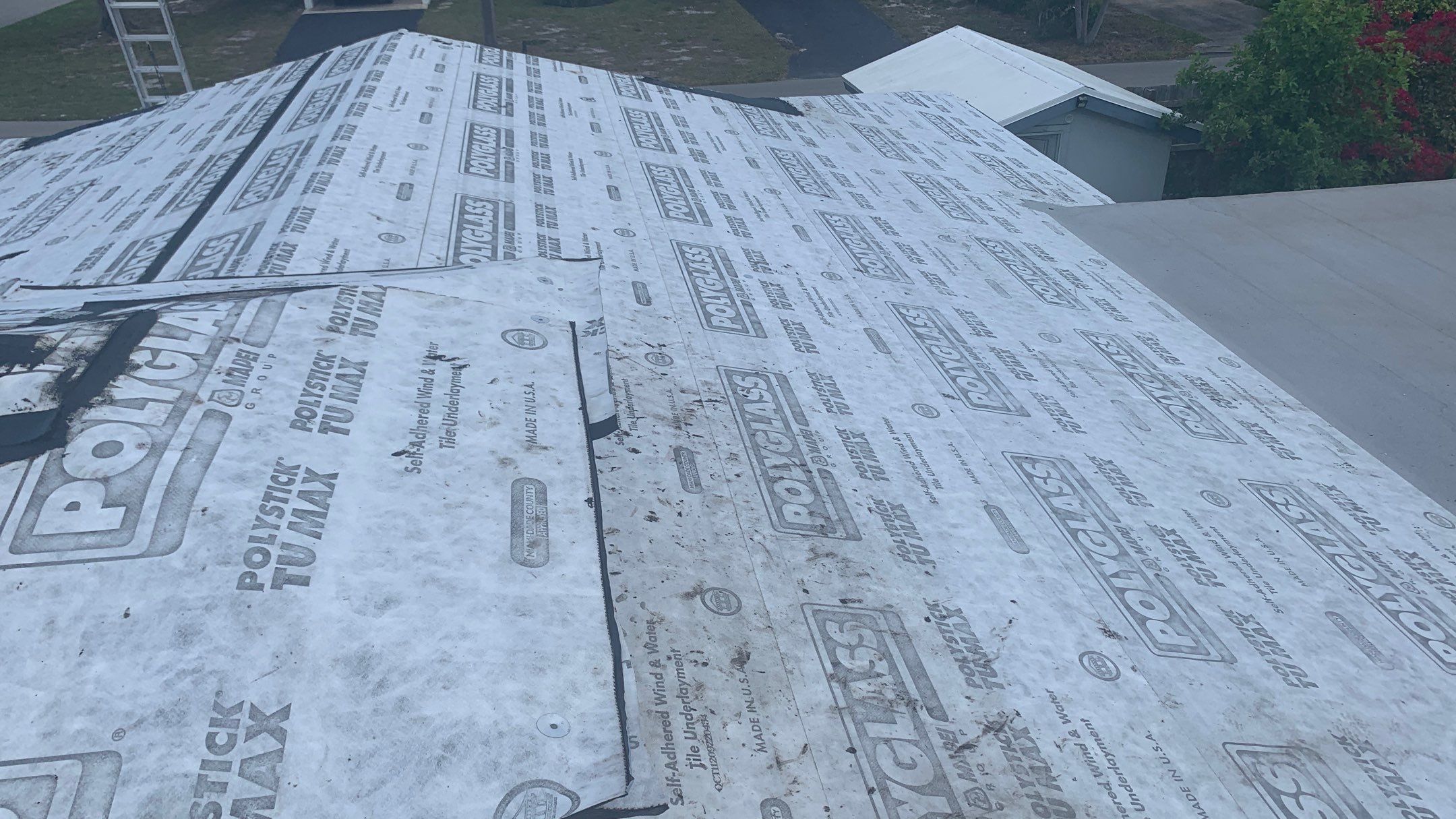 Residential Roofing Installation using 1" Nail strip metal roof by BLUES BROTHERS ROOFING