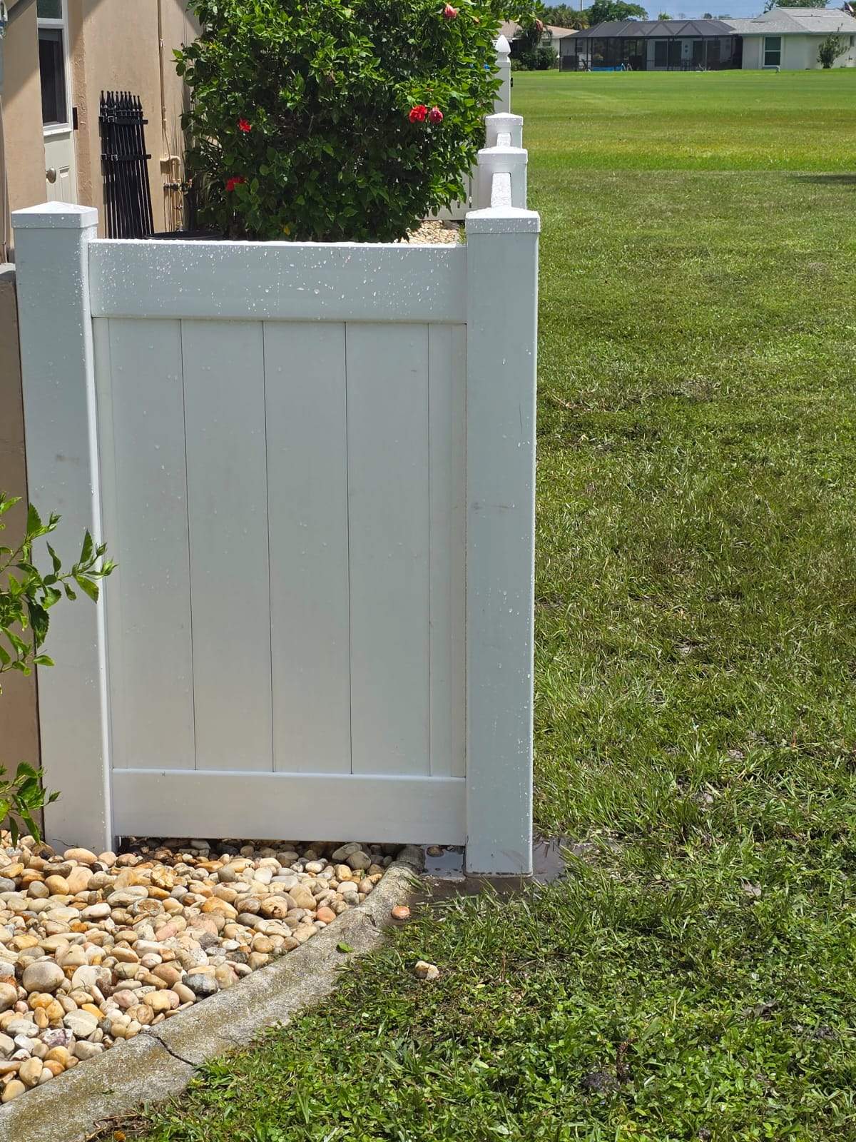 Residential White Vinyl Privacy Fence Enclosure in Rotonda West by True Fence LLC