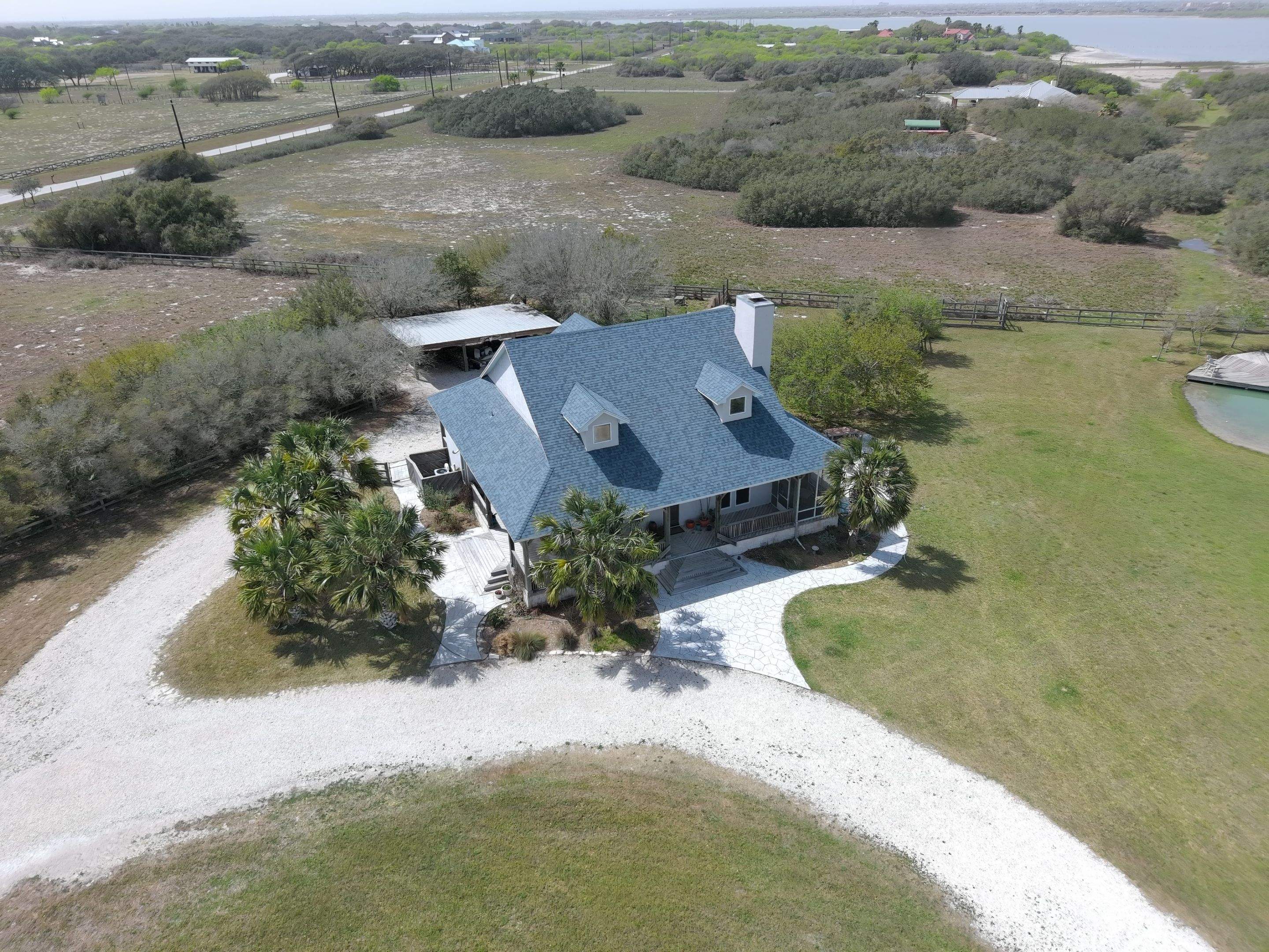 Long Horn Retreat by Bayfront Roofing and Construction