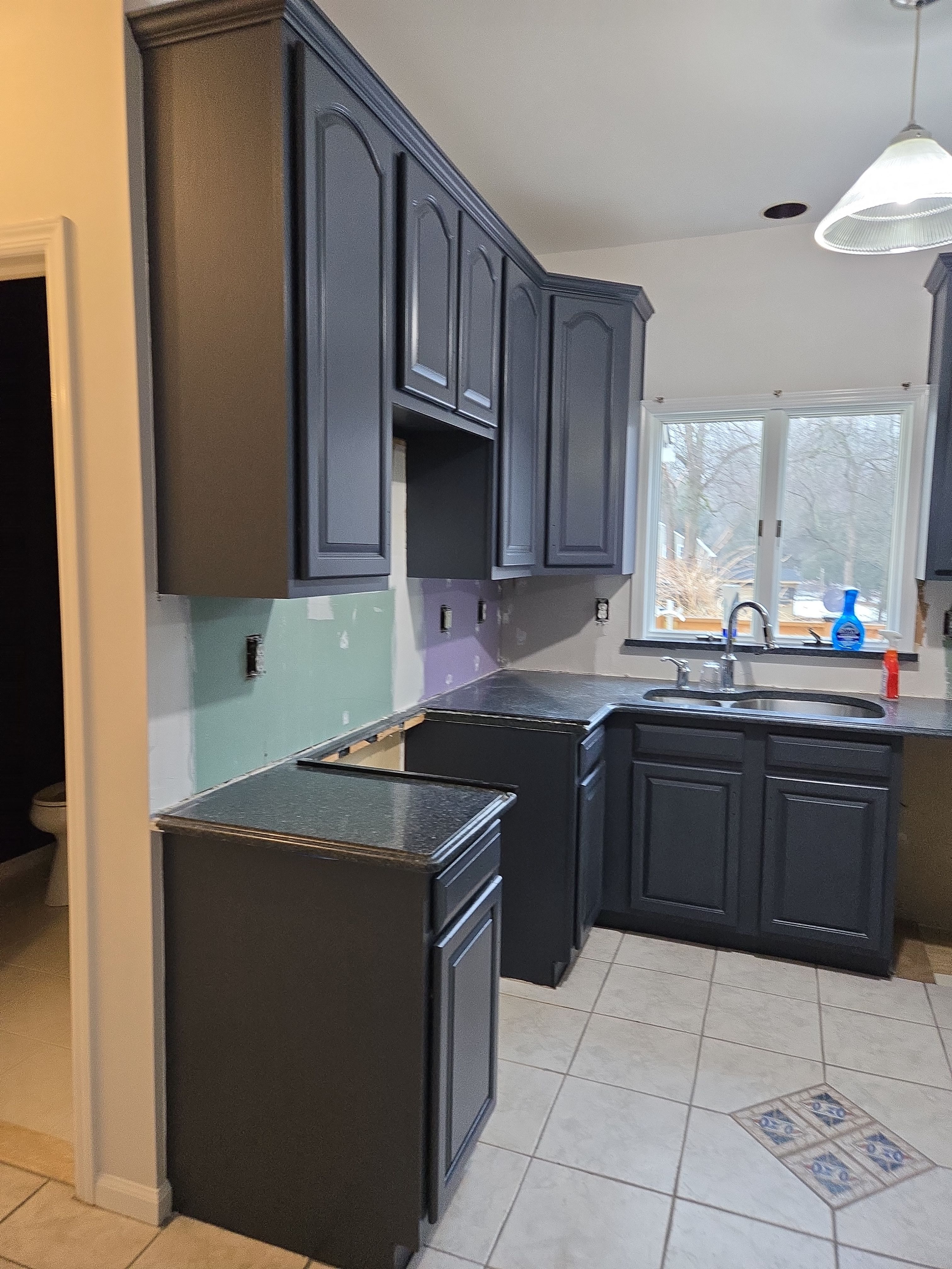 Cabinet Refinishing using Benjamin Moore Command by Spectrum Painting, LLC