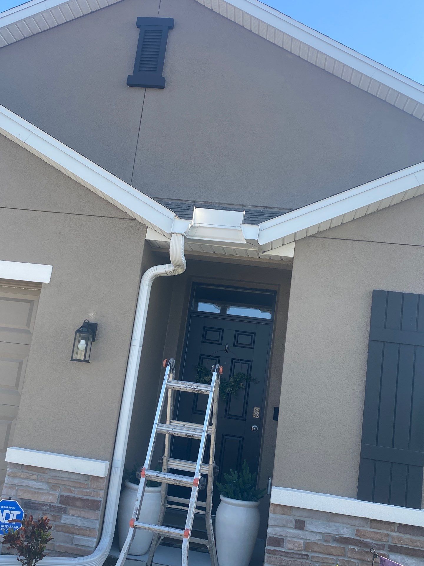 Gutter System with Downspouts in Bradenton FL by Gutter Professors