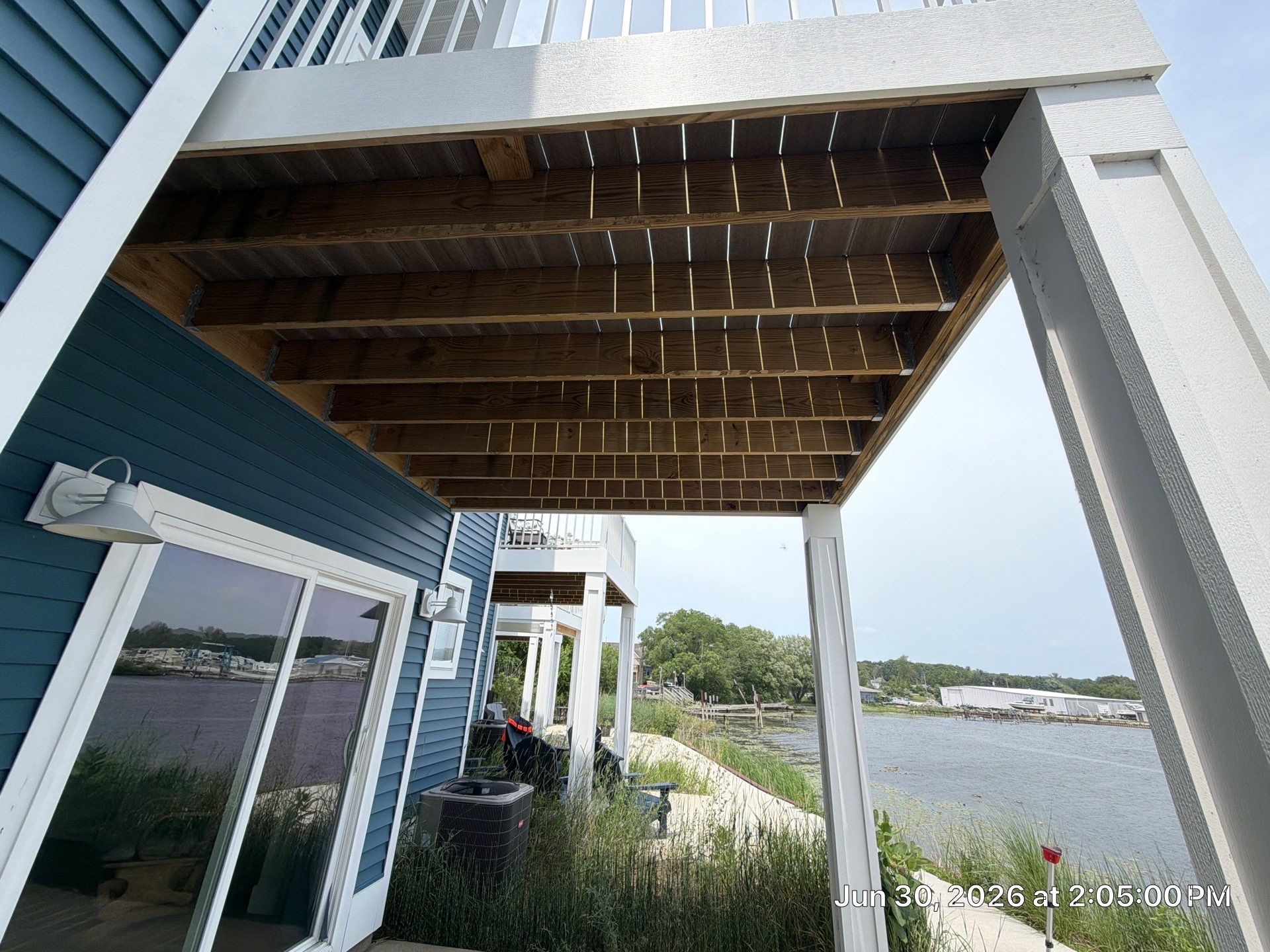 Underdecking Installation for Waterfront Townhouse in Manistee by Rainbow Seamless Systems