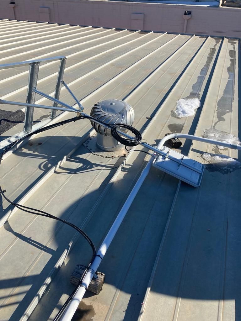 Roof Repair on a metal roof  by Grell Roofing, LLC