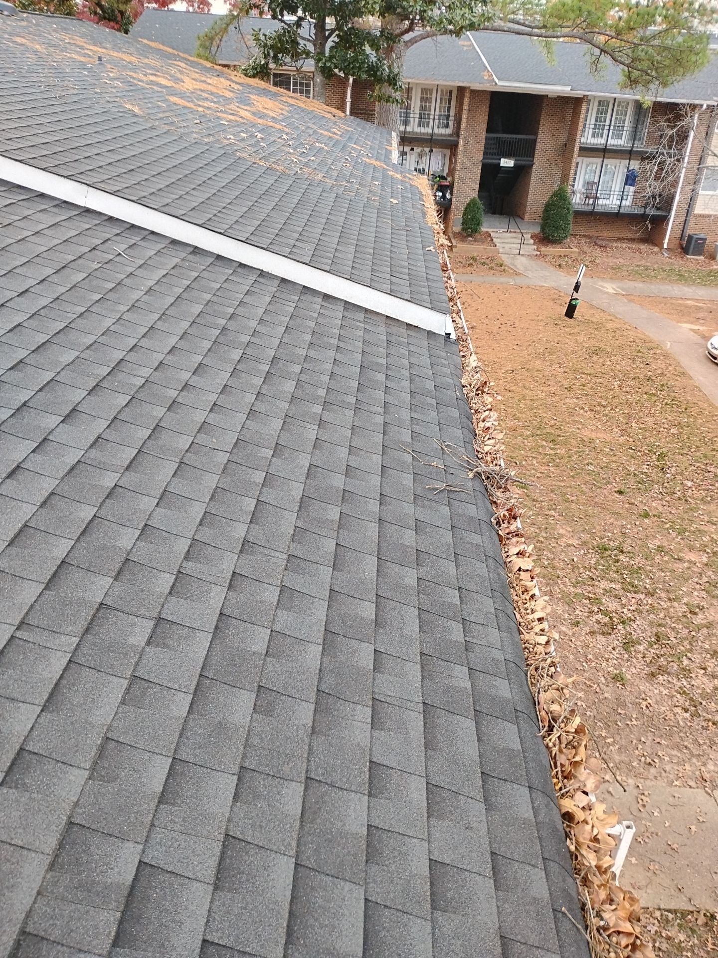 HOA gutter cleaning before photo.