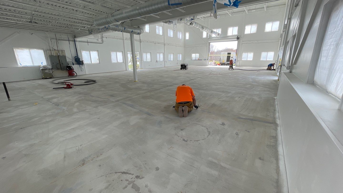 Quinn Bros Commercial TransFLOORmation by Symphony Concrete Coatings
