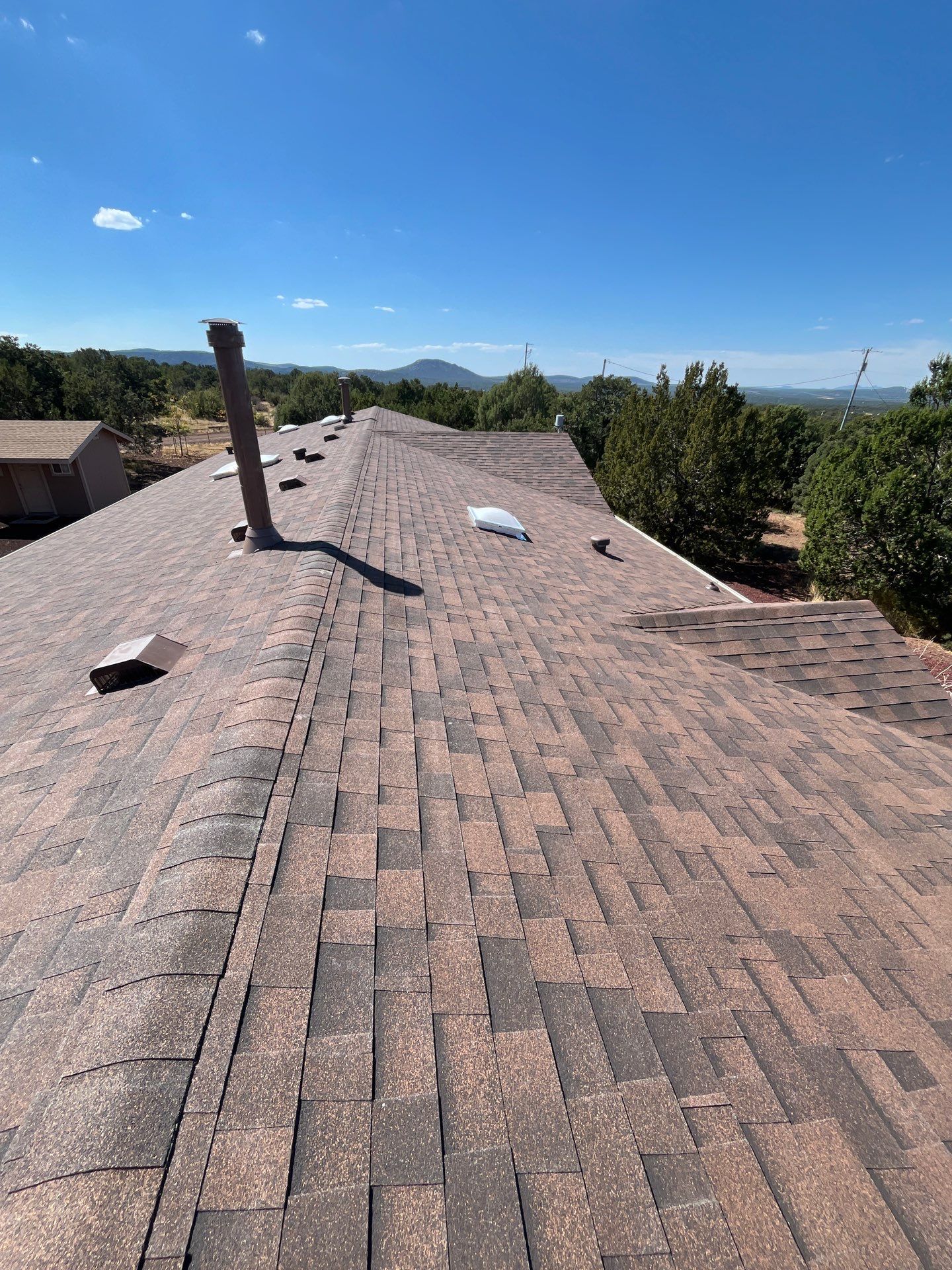 Mission Brown Shingles by Reimagine Roofing