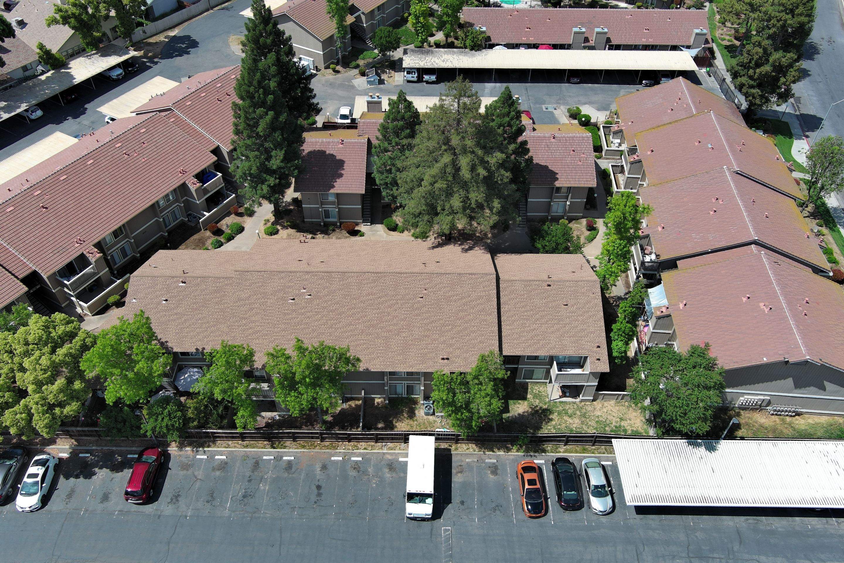 Removed tile from roof and replaced with shingles by Straight Edge Roofing Inc