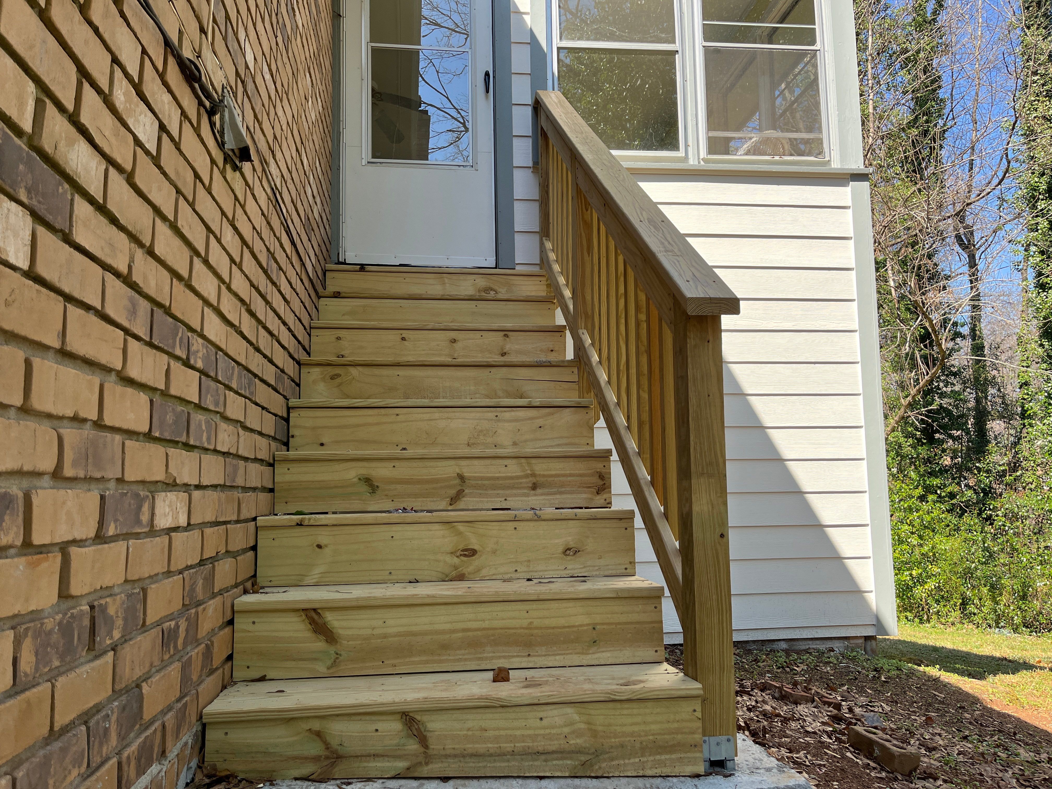 Board and Batten Siding Installation and Railing Replacement in Lilburn, GA by Nelson Exteriors 