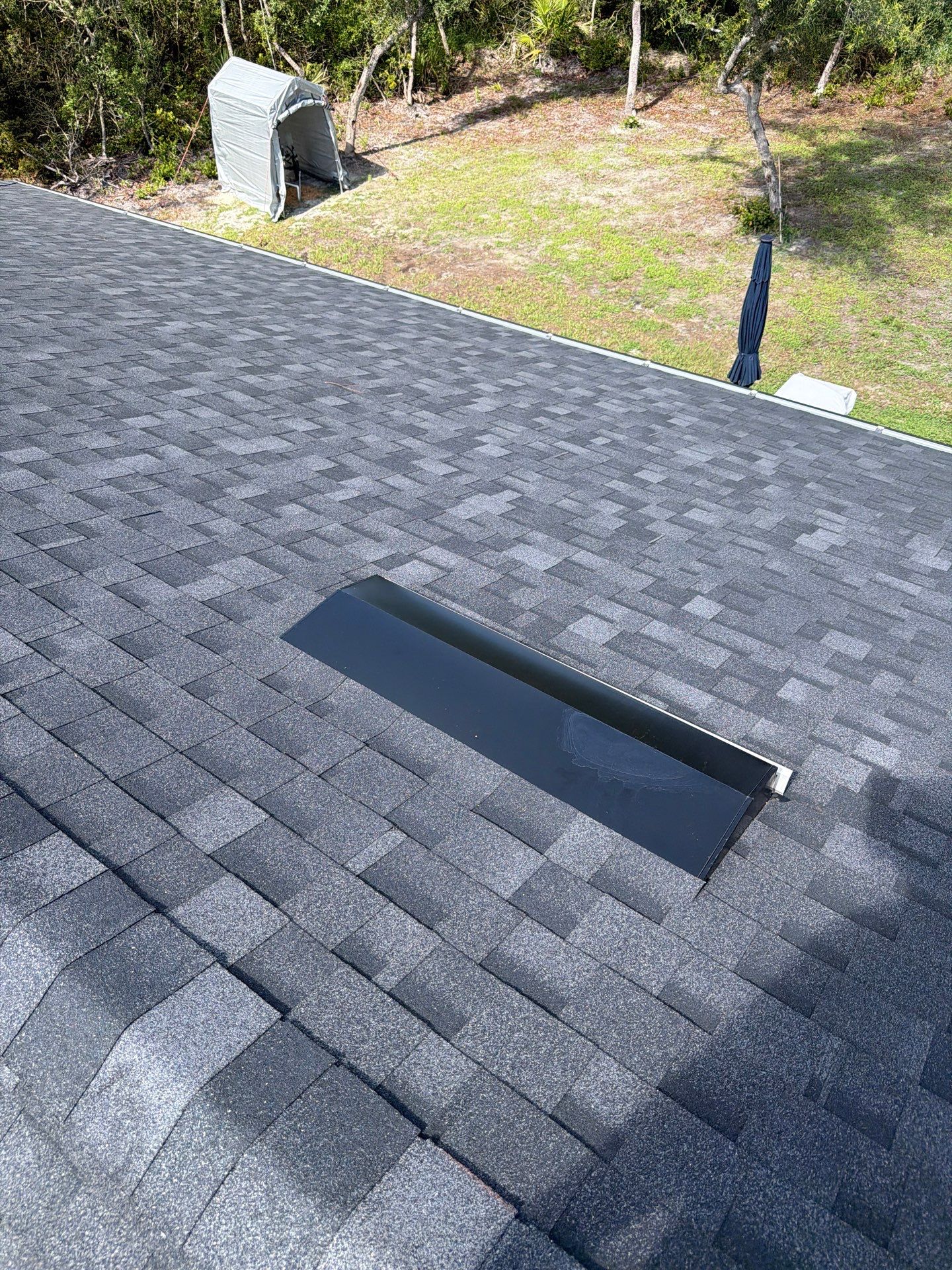 GAF Asphalt Shingle Roof Replacement with Skylight in Eustis by Fortified Roofing Solutions Corp.