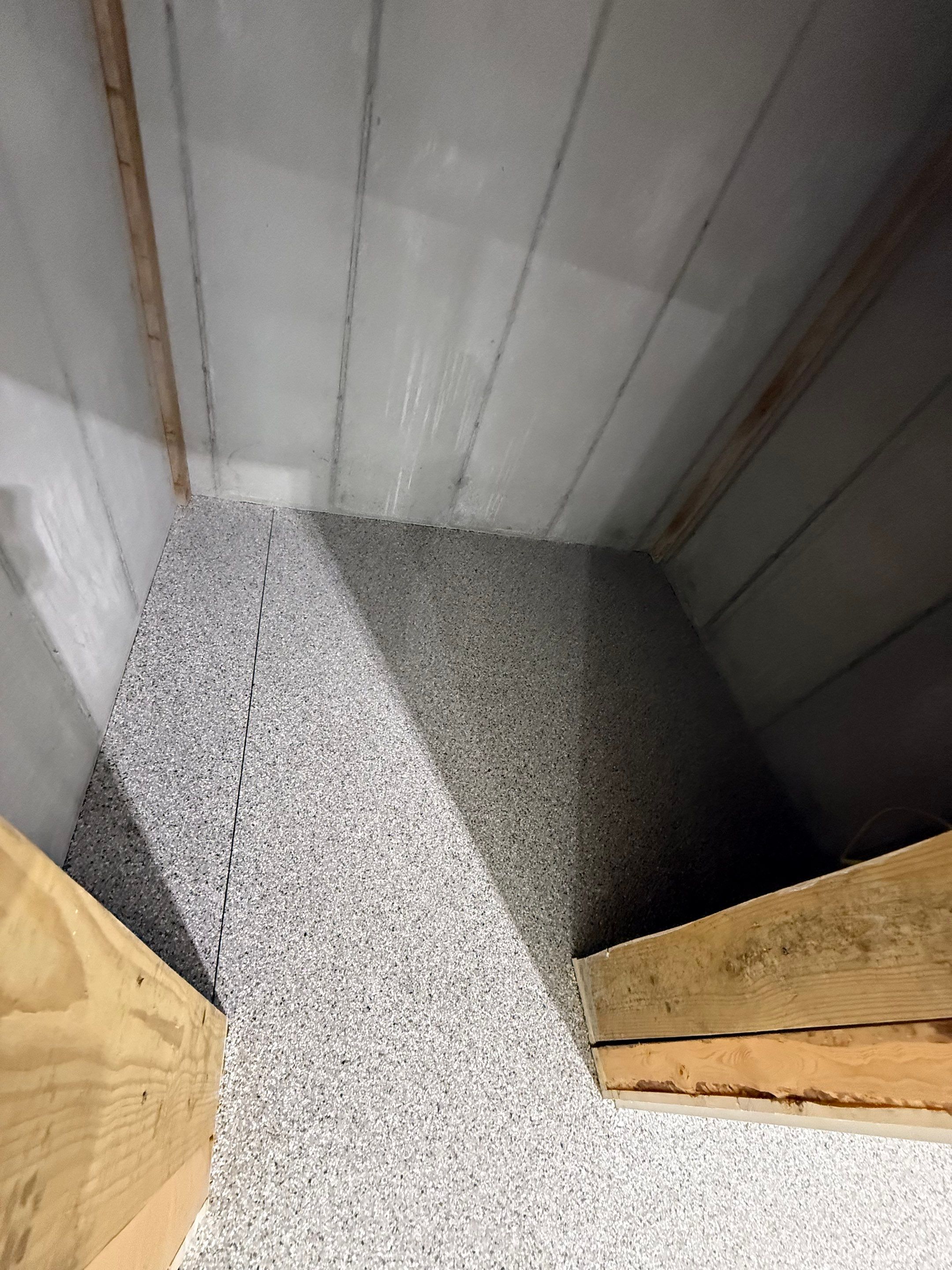 Custom Speckled Floor Coating for Large Montrose Shop by Select Painting, Coatings & Garage Cabinets