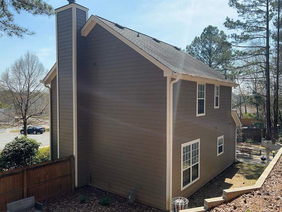 Green Exterior Paint and James Hardie Siding Transformation in Smyrna, GA by Nelson Exteriors 
