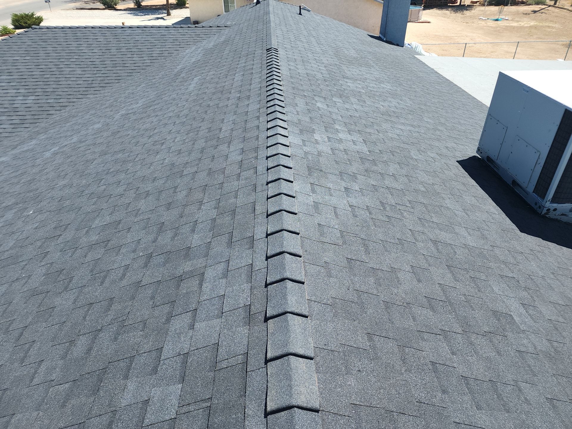 Onyx Black Shingles by Reimagine Roofing