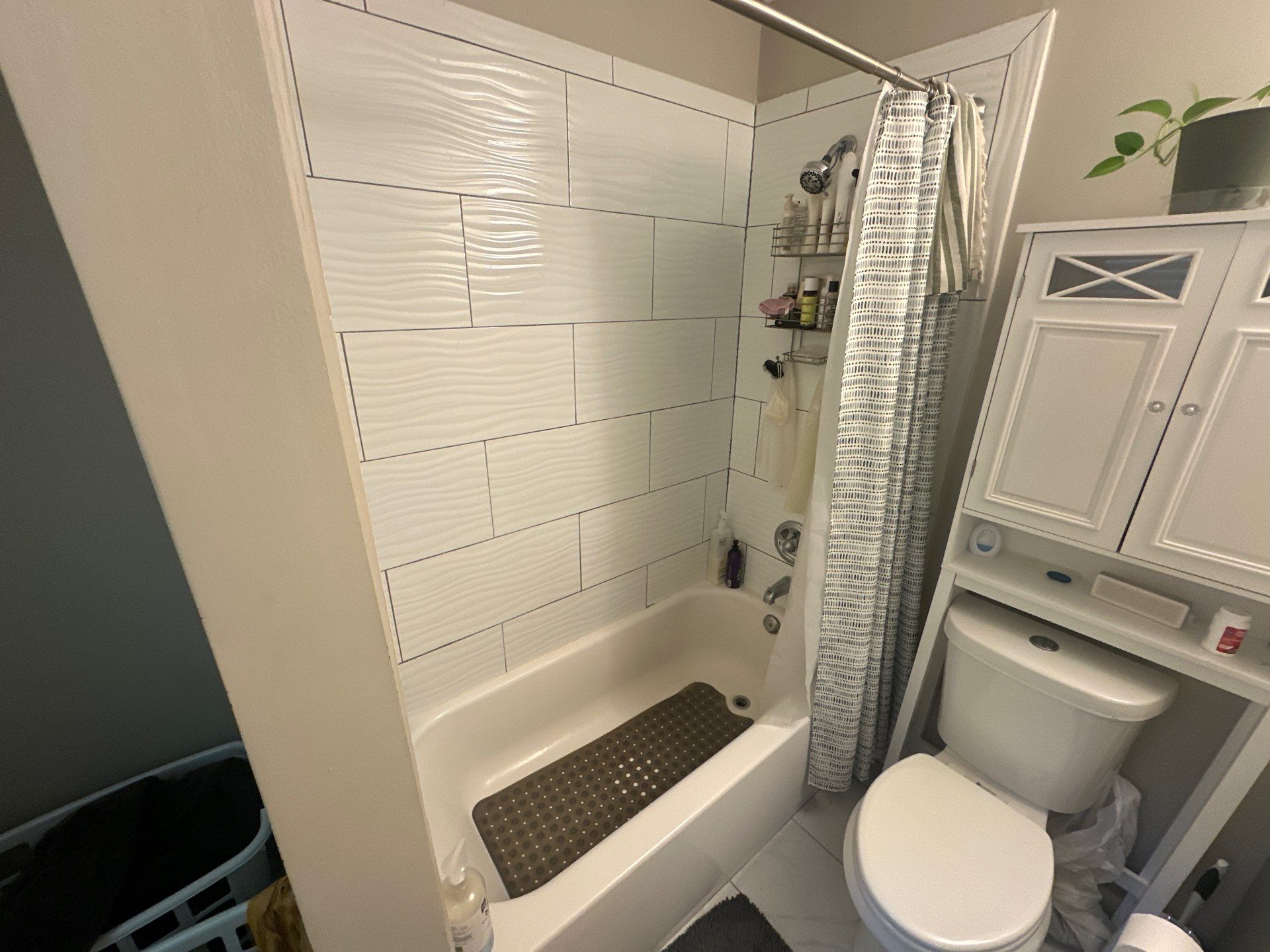 Tub to walk-in shower conversion by Prudencio