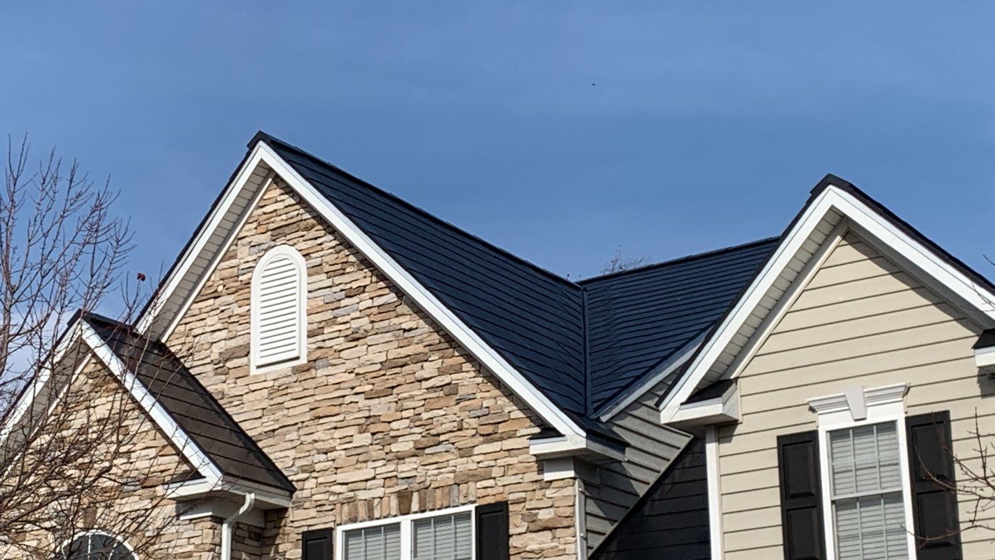 Tesla Solar Roof and Gutter Installation by American Home Contractors