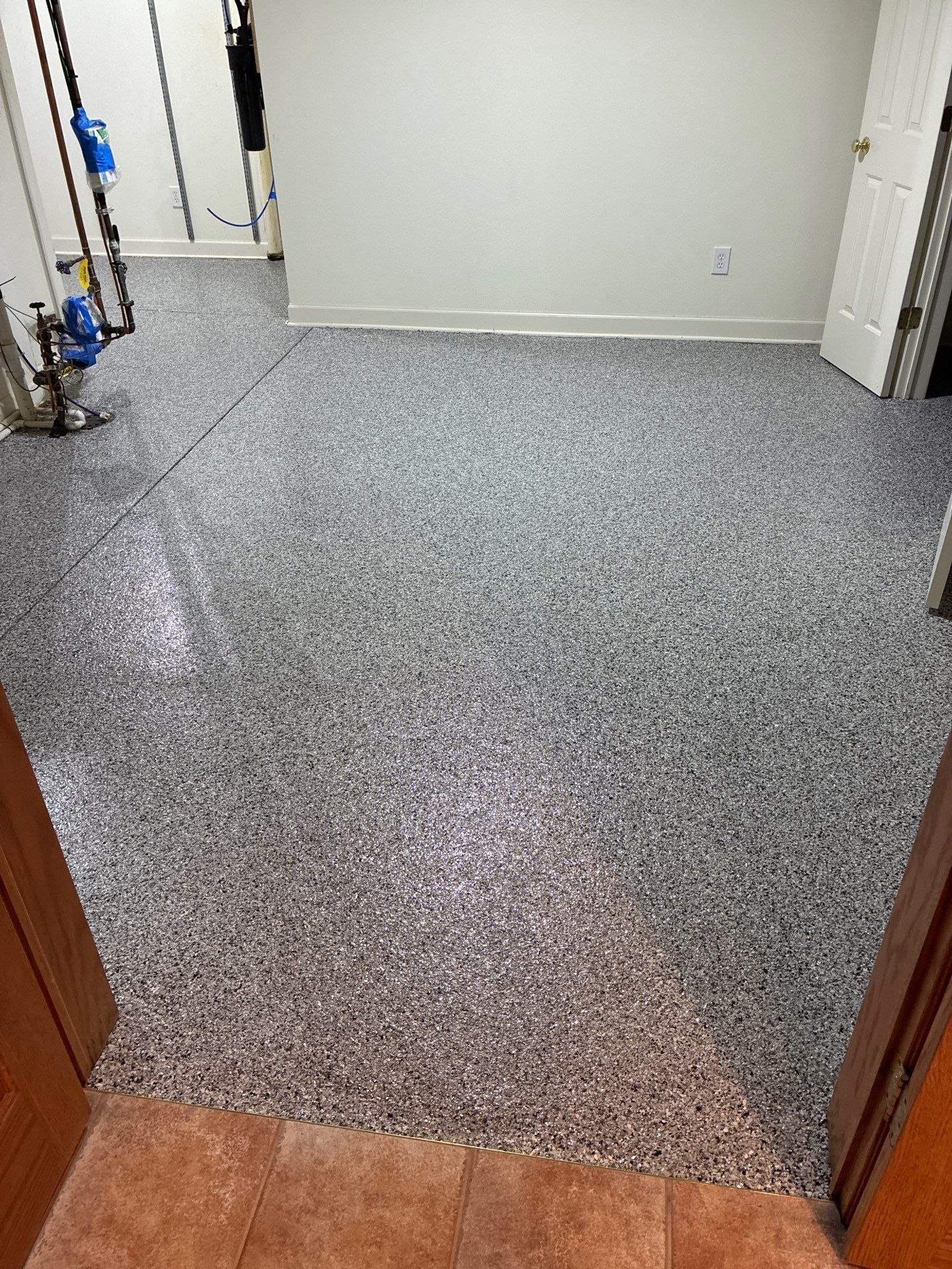 Keystone Flake Floor Coating in West Des Moines by Revival Concrete Coatings