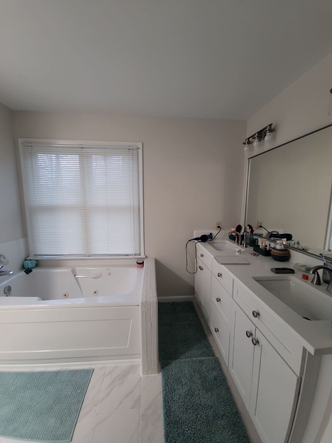 From Cramped & Carpeted to Bright & Modern: A Cary Bathroom Transformation by Elite Remodeling and Design LLC