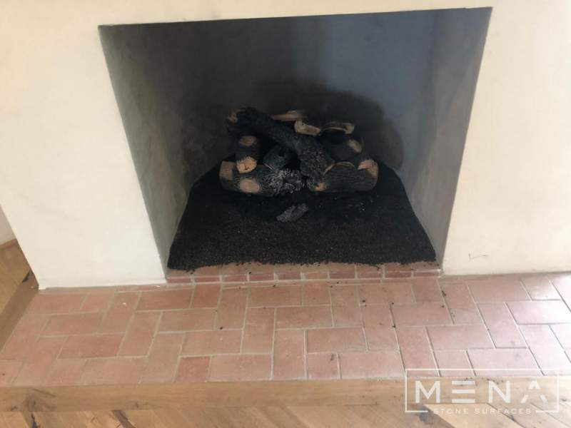 Kitchen, outdoor kitchen and pool brick floor installation by Mena stone surfaces