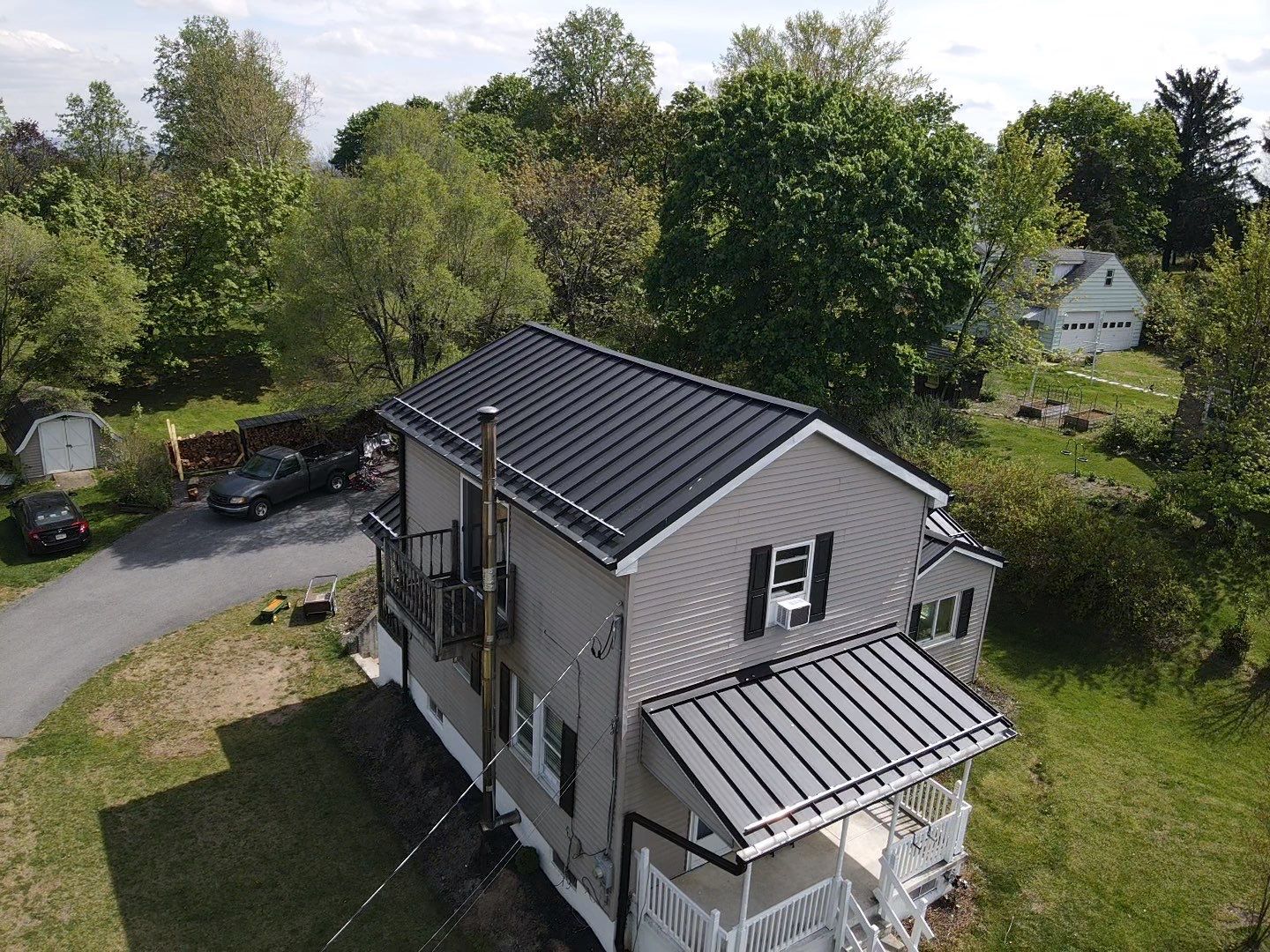 Residential Roofing Installation using Texture Standing Seam by Teflon Roofing