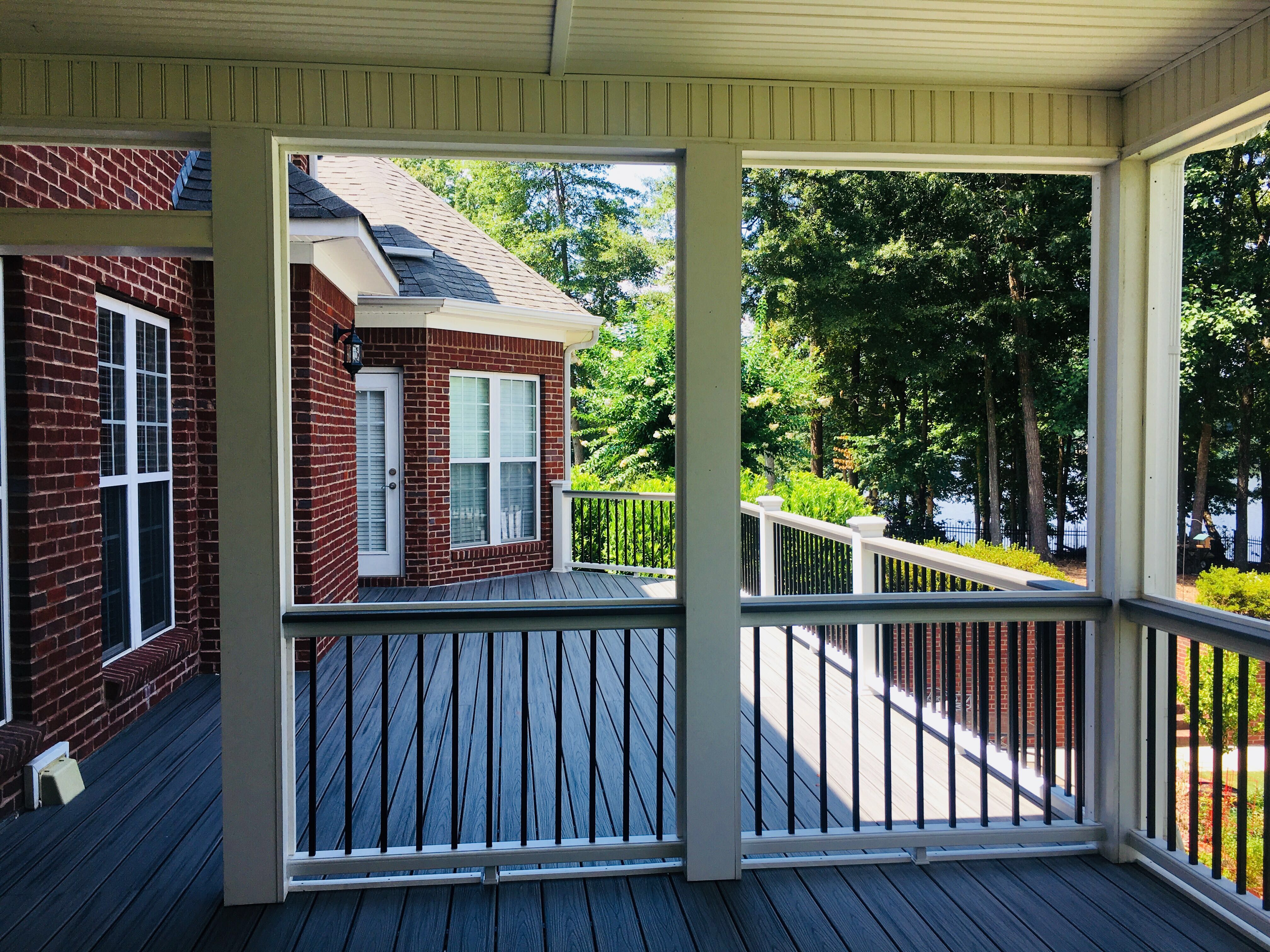Elevated Composite Deck and Screened Porch Construction in Newnan by Swift Home Renovations