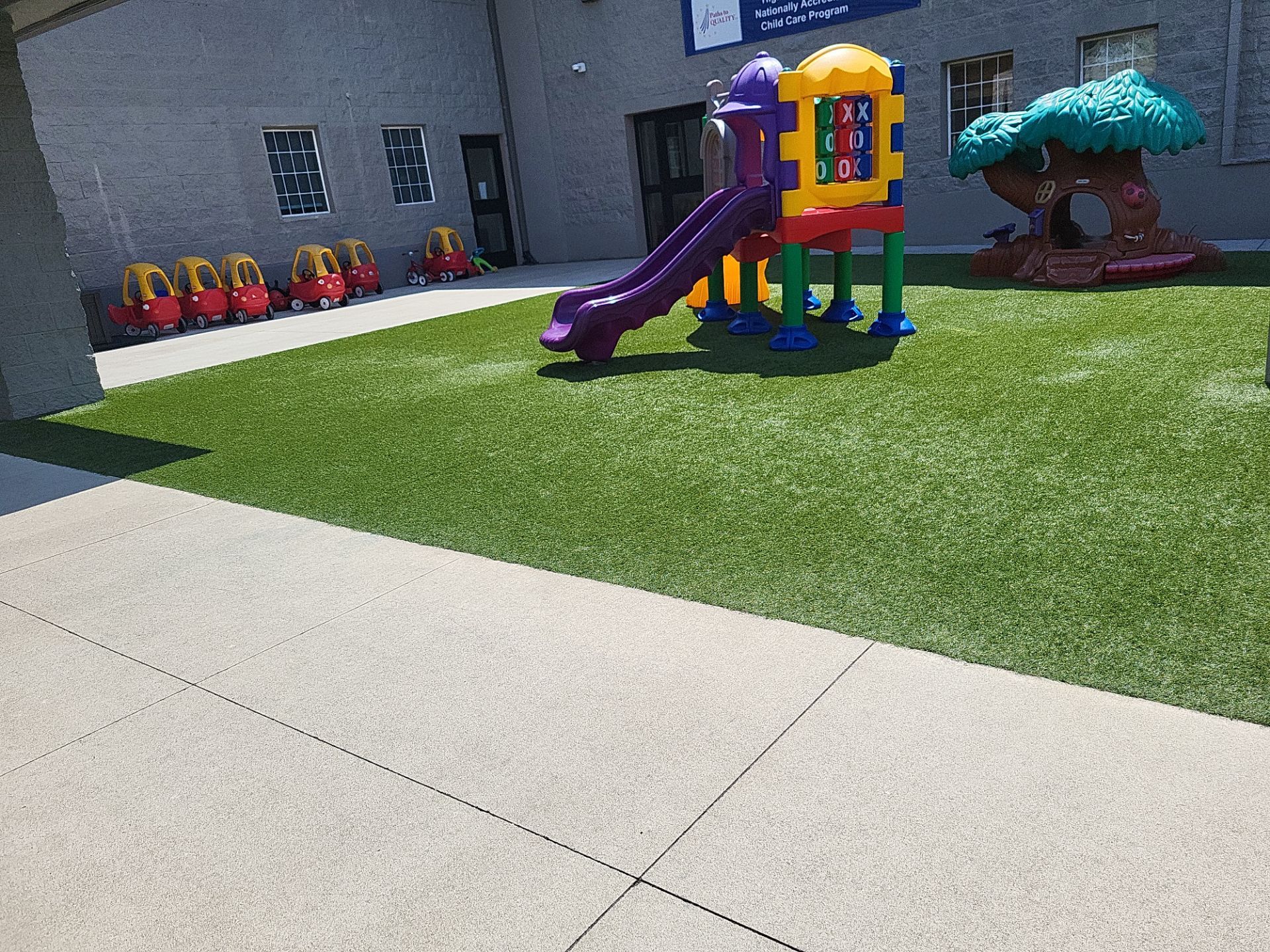 Indianapolis Child Care Center Playground Synthetic Turf Installation by Southwest Greens Midwest