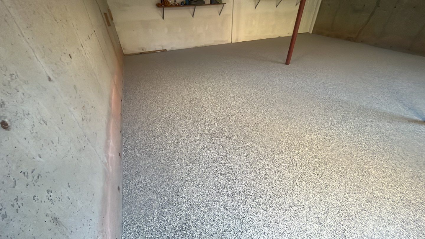 Garage in Londonderry, NH 03053 by Symphony Concrete Coatings