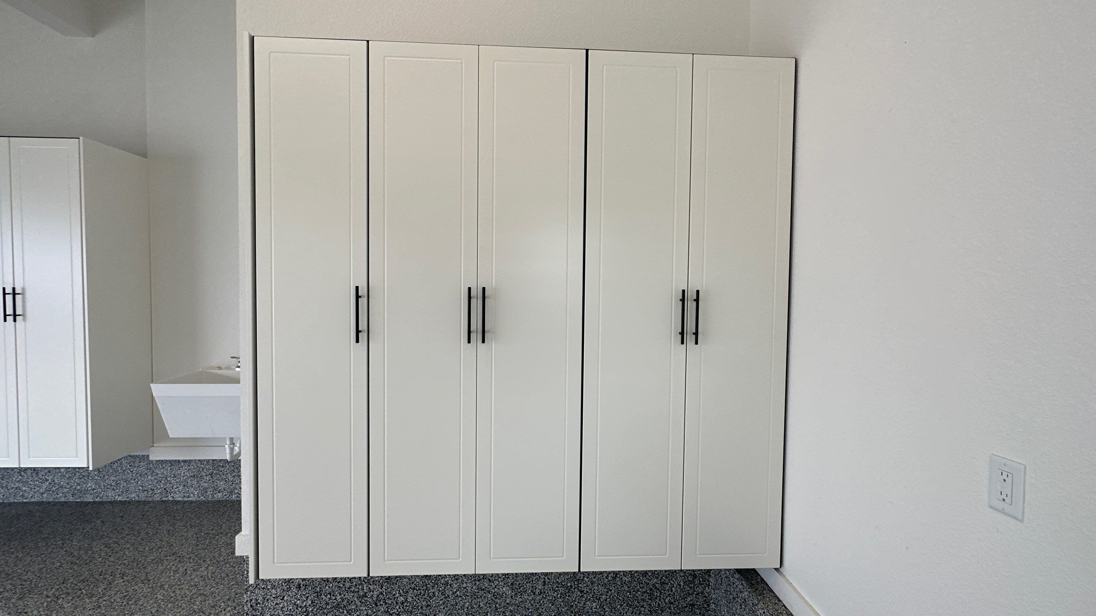 Mike & Pam transformed their garage with a Banner Garage Floor and Cabinets by Banner Garage