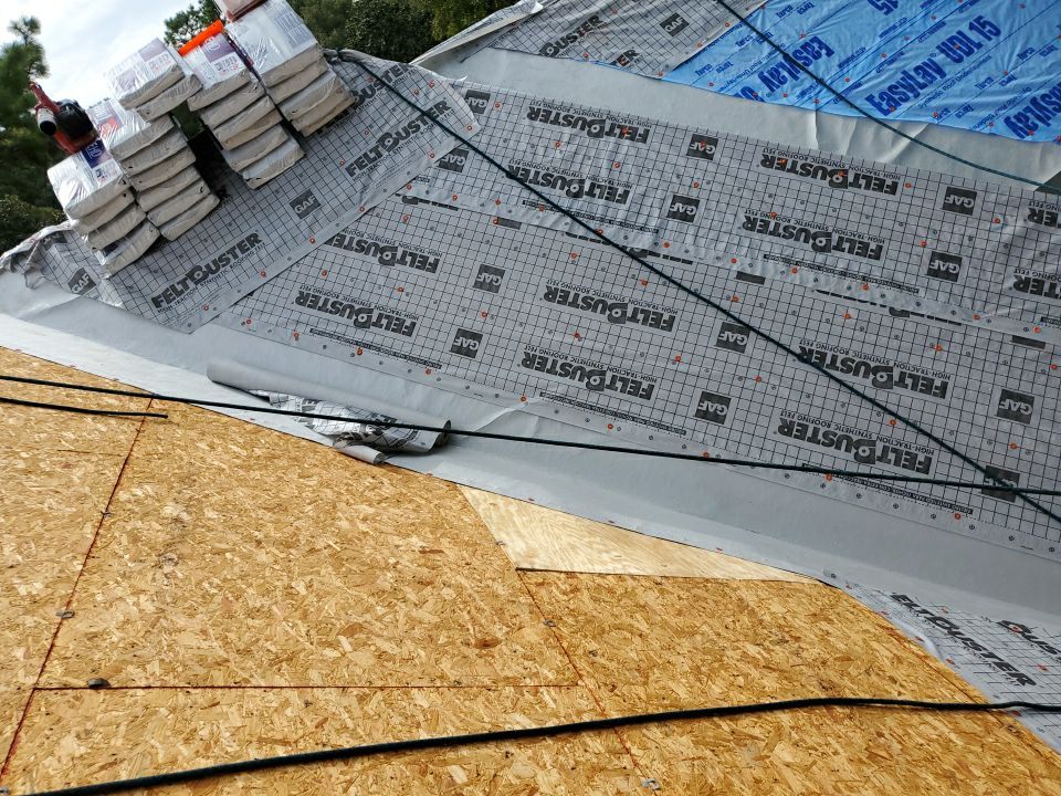 Residential Roofing Installation using Roof Replacement by American Roofing & Construction LLC