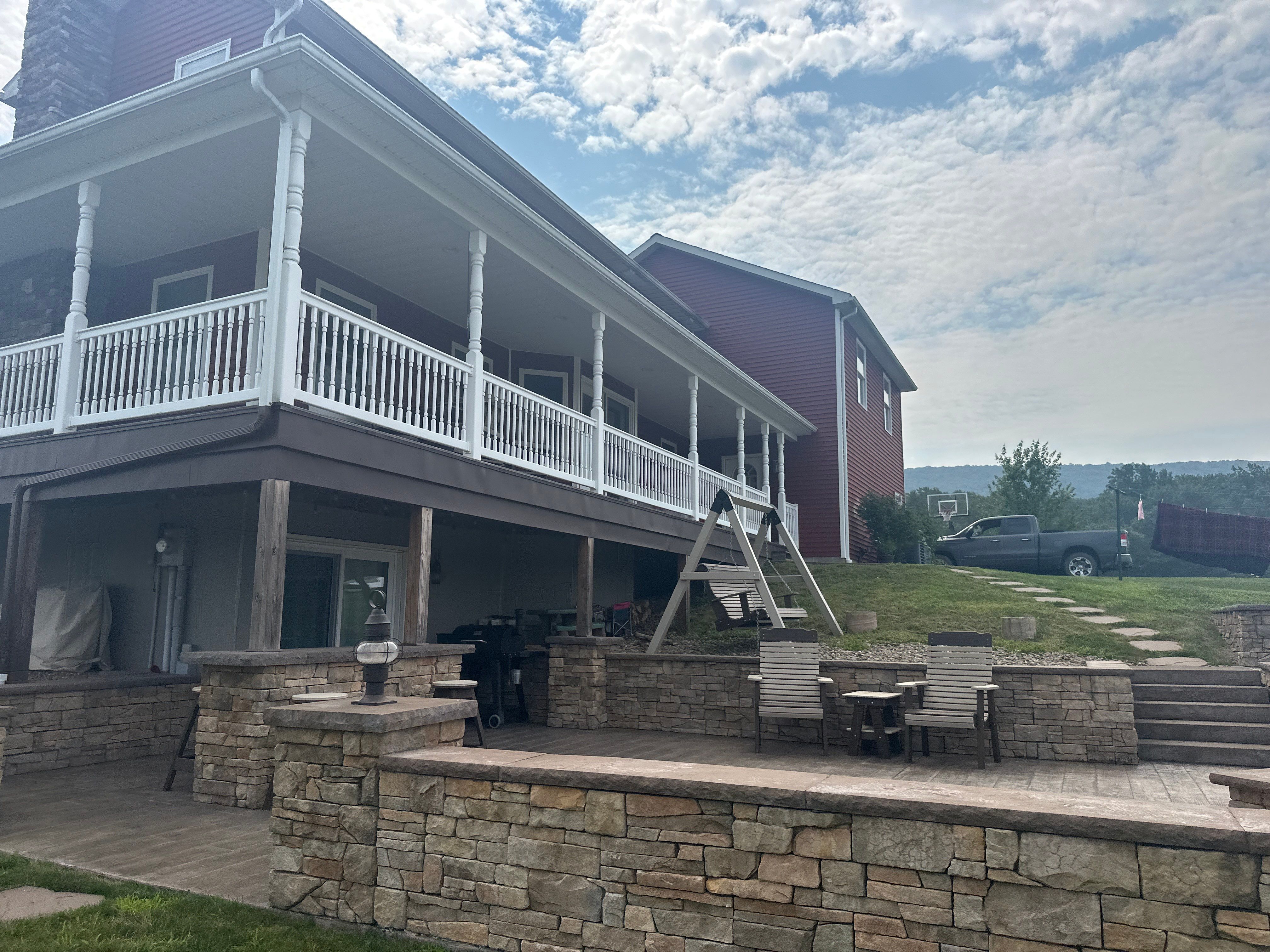 Covered Deck Addition With Custom Gable Roof in Tower City by Esh Builders