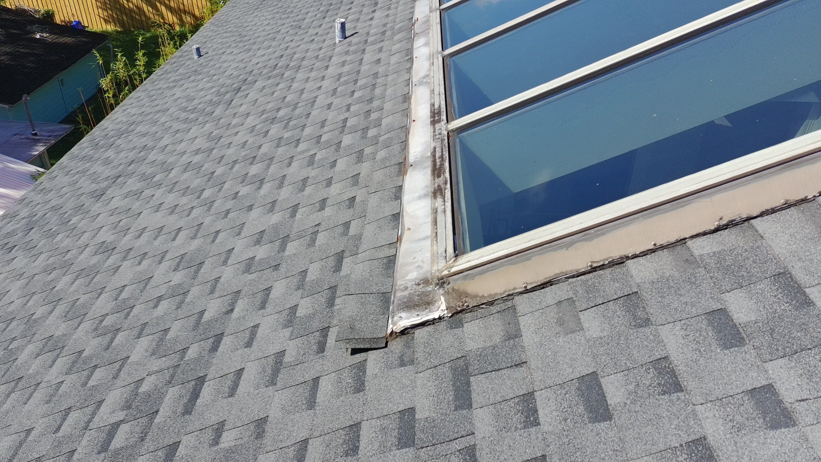 Ridge Skylight Repair and Shingle Roof Maintenance in Winter Park by Fortified Roofing Solutions Corp.