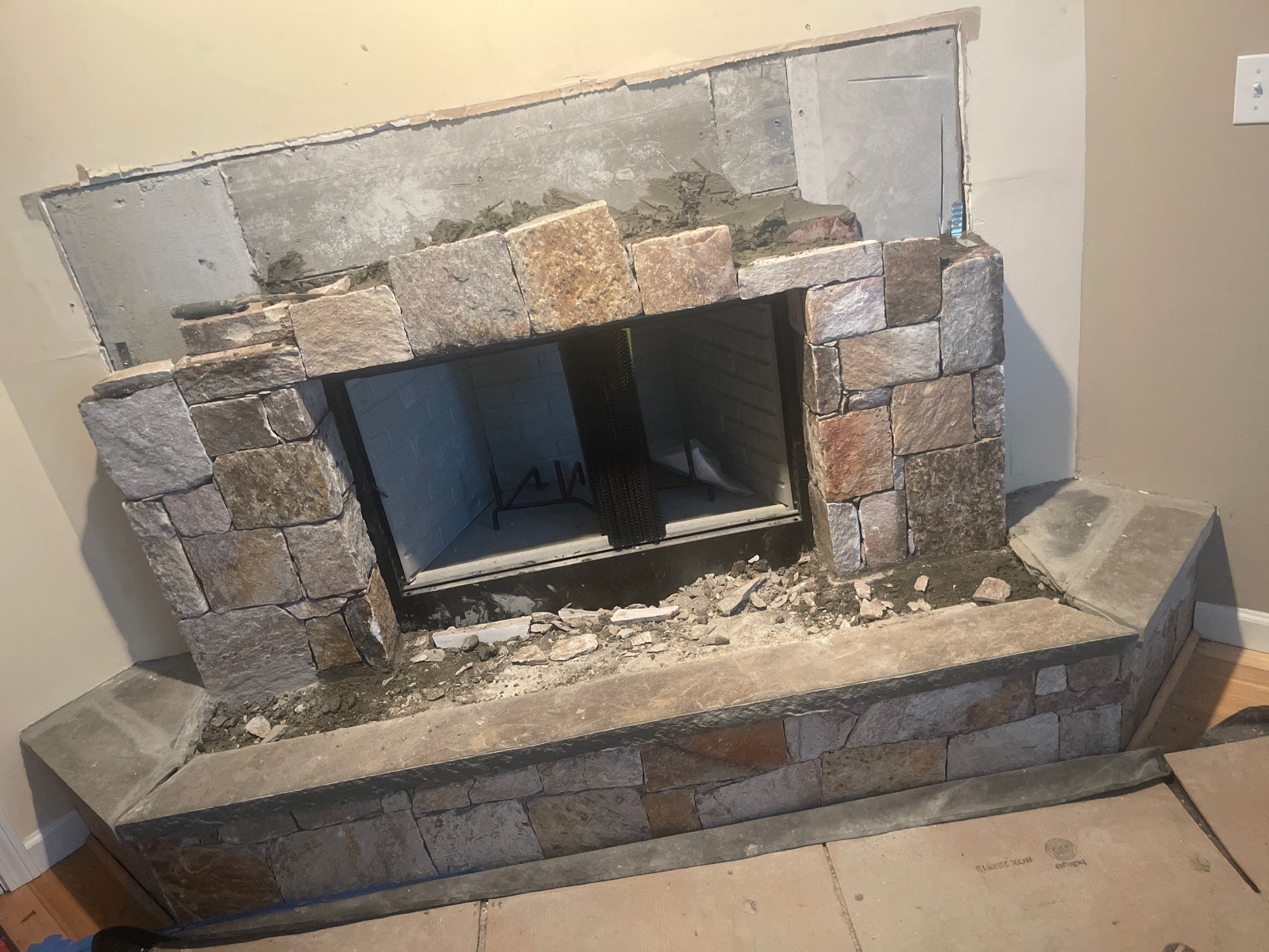 Wood Fireplace w/ Reused Stone by Neighborhood Chimney Services 