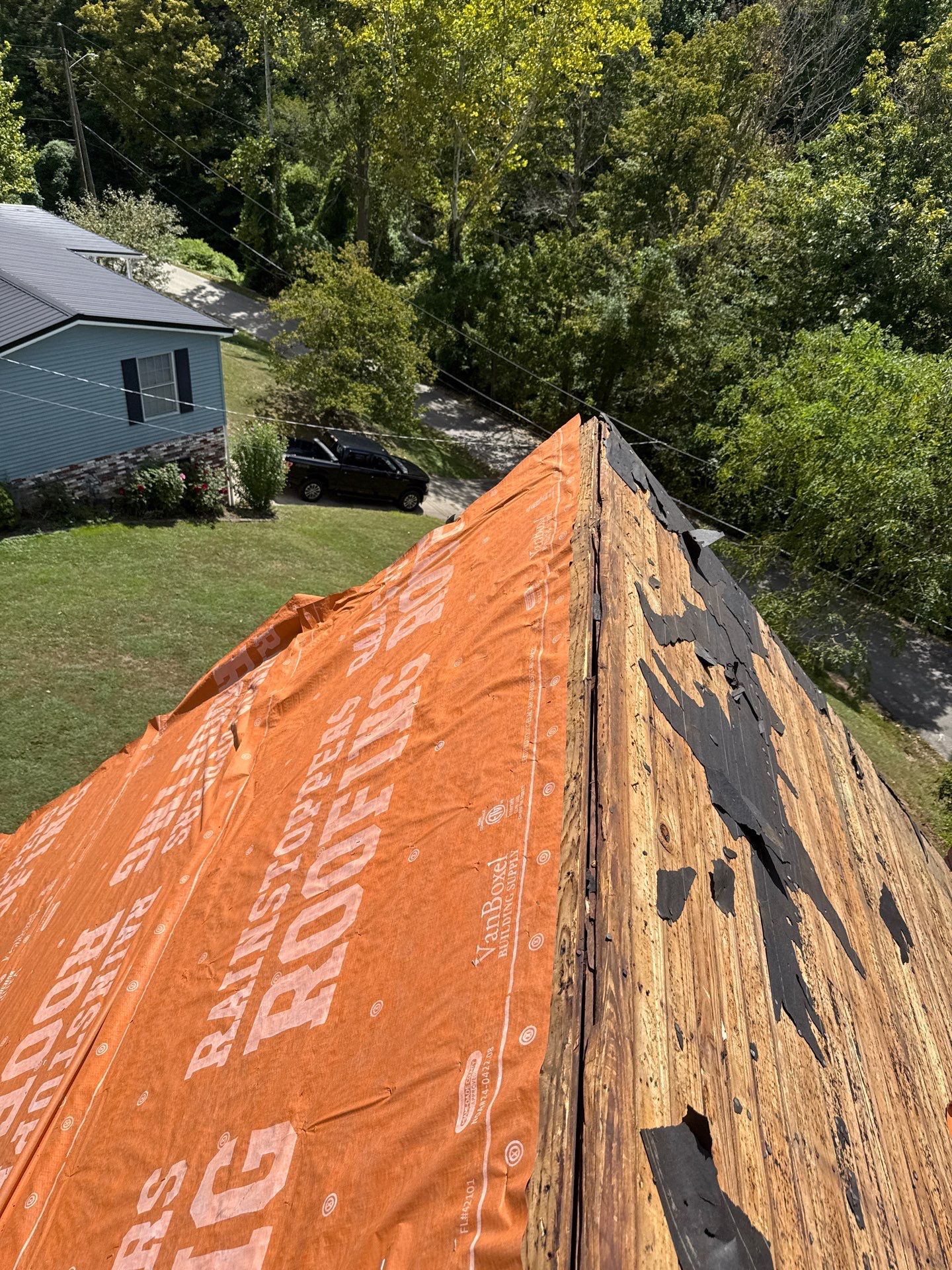 Residential Roofing Installation using GAF Timberline HDZ Charcoal by Rainstoppers Roofing
