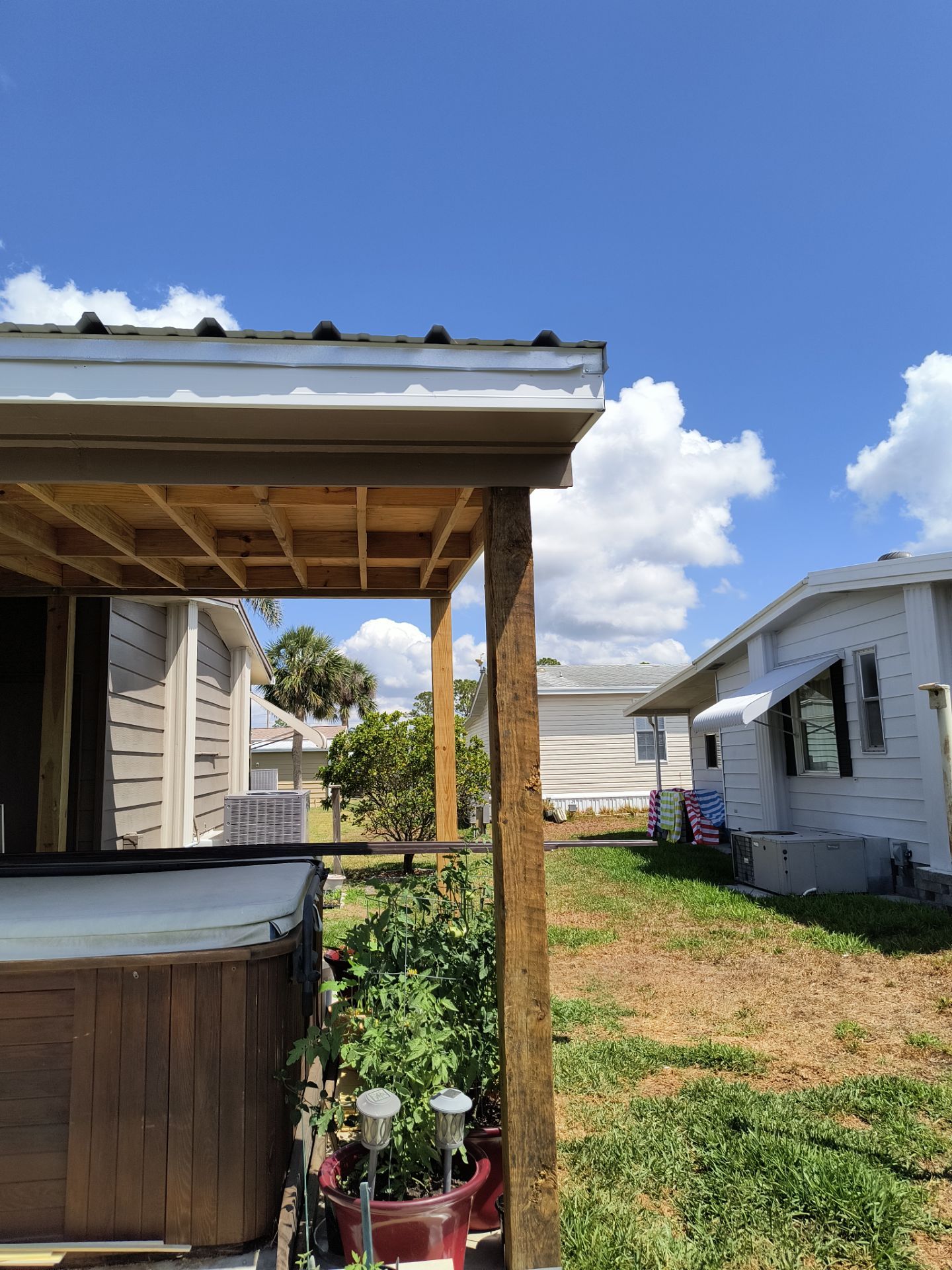 6 Inch Seamless Gutters using 3X4 Elbow Downspout in Venice FL by Gutter Professors
