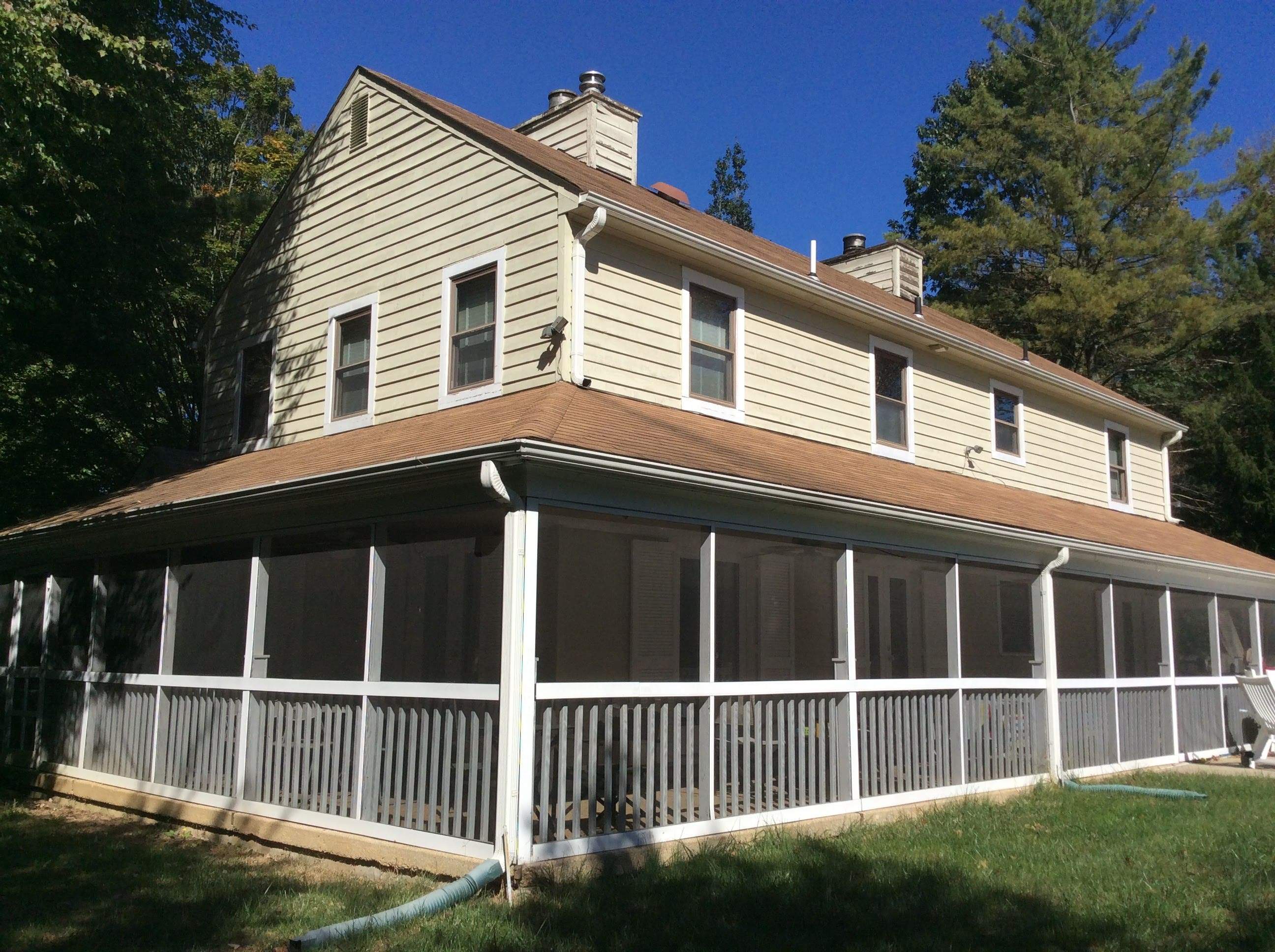 Residential Roofing Installation using Pewterwood Shingles  by Alpha Design Services
