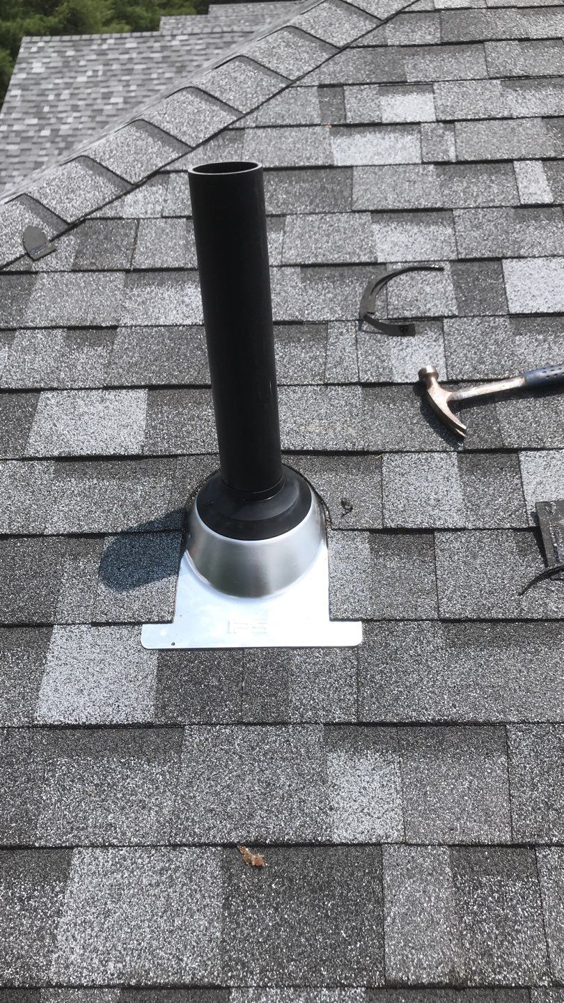 Commercial Roofing Installation using EPDM with white gutters by A Plus Exterior